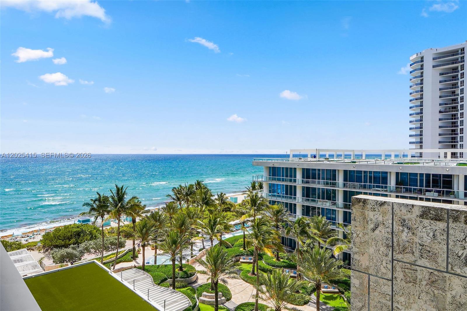 One of the few – and BEST Priced - 1 bedroom South-facing hotel suite units with a BALCONY at Carillon Miami Wellness Resort, a premier oceanfront luxury property. Separate bedroom with king bed, living room, kitchenette with 2-burner stove, microwave, dishwasher, major upgrade of Toto toilet (valued over $8,000), upgraded washer/dryer combo, new A/C unit, under counter refrigerator.  Owner receives 8 spaces (names) on list that is, in essence, 8 “resident memberships” for full use of all amenities and classes (offered 7 days a week from morning to early evening) at no additional cost. Enjoy South Florida’s largest 70,000 sq ft fitness/spa center with European-inspired thermal experiences, and a full array of wellness services. Amenities also include salon, 4 pools, concierge, restaurant overlooking ocean, cafe, bar, Corner Store, 24hr security, valet, beach service and only steps away from the boardwalk and beach.  Walking neighborhood with all conveniences – Publix across the street, restaurants, cafés, drug stores, etc.  Live the lifestyle of luxury and wellness that you deserve!