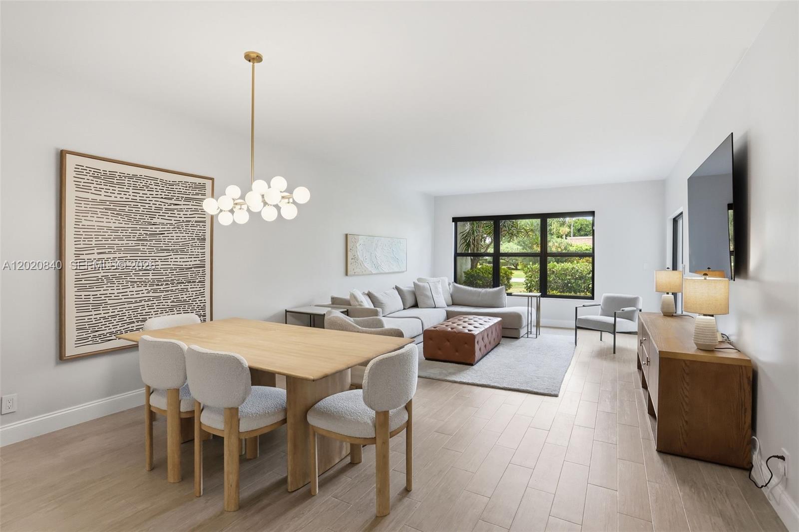 Beautifully renovated 2-bedroom, 2-bath condo in the highly sought-after Seagate Country Club at The Hamlet, where membership is optional. This light-filled residence has been thoughtfully updated with impact front door and windows, new lighting throughout, and a modernized kitchen featuring quartz countertops, matching backsplash, and contemporary cabinetry. Additional upgrades include renovated vanities, a stylish bar area, new interior doors, updated electrical panel, and more.

The bedrooms offer two large walk-in closets, while the residence also includes a covered carport space and dedicated storage unit. The Florida room has been upgraded with a solid concrete block wall and impact windows, opening to a charming outdoor patio. Enjoy access to the community pool and clubroom, all within a gated, beautifully maintained community. The optional Seagate Country Club membership enhances the lifestyle even further, offering access to championship golf, tennis, pickleball, a dedicated clubhouse with pool and fitness center, beach club services, and a marina. Perfectly located just minutes from Downtown Delray, the beach, and everyday conveniences along Military Trail and Atlantic Avenue, this condo delivers an ideal blend of comfort, style, and prime Delray living.