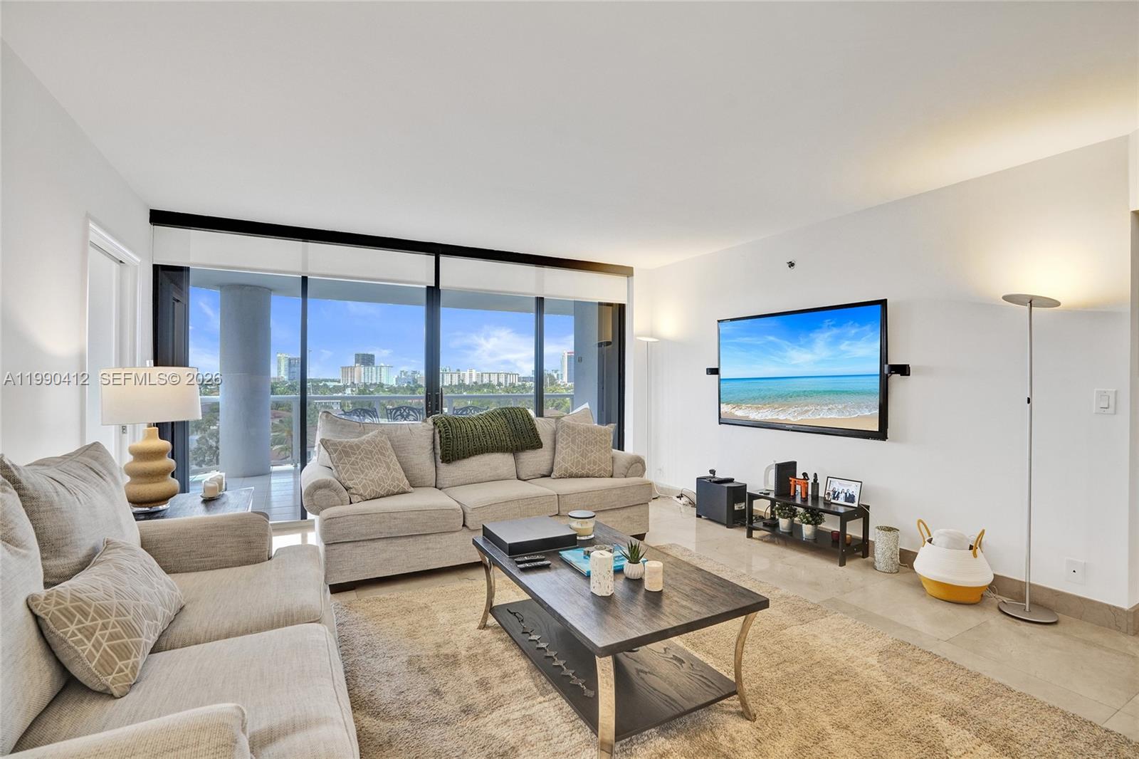 Affordable luxury meets incredible value in this corner unit at a boutique building in Aventura! This impeccably maintained 3-bedroom, 2-bathroom residence offers 1,820 square feet of bright, airy living space, seamlessly complemented by sleek marble floors and floor-to-ceiling windows that flood the home with natural light. The standout feature? A sprawling 450+ SF terrace, perfect for savoring serene, unobstructed views and outdoor living at its finest.

Recent building updates, including brand-new elevators (undergoing), add to the appeal, while some units are selling under market value—making this the perfect time to invest. The thoughtfully designed layout includes a spacious kitchen with a breakfast nook, ideal for casual mornings or entertaining. The unit also comes equipped with in-unit laundry, assigned parking, valet, and private storage for unmatched convenience.

Beyond your doorstep, enjoy resort-style living with incredible amenities: a heated pool, hot tub, sauna, gym, tennis courts, a barbecue area, and a gazebo for gatherings. Concierge and doorman services provide peace of mind, while the resident’s lounge and media room offer spaces to unwind.

Don’t miss this rare opportunity to combine elegance, comfort, and value in a highly desirable location. Schedule your private showing today!