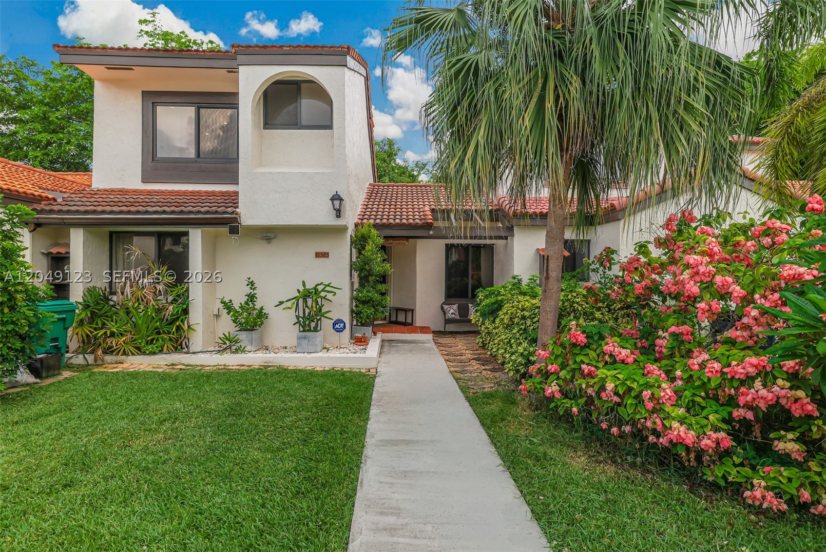 Charming 2/2 townhome in the heart of Kendall! Home features a bright, open layout w/ laminate wood and ceramic tile floors. The kitchen is equipped with newer appliances and offers plenty of cabinet and counter space for everyday cooking and entertaining.

Upstairs loft serves as the private primary suite, complete with its own full bathroom and an open, airy feel. The 1st-floor bedroom & full bath provide flexibility for guests or a home office.

Step outside to your own private backyard retreat, where a beautiful tropical mango tree provides shade and seasonal fruit—perfect for relaxing, entertaining, or enjoying South Florida living. Conveniently located near excellent schools, shopping, dining, parks, and major highways, this move-in-ready townhome offers comfort, convenience, and exceptional value. Don't miss this wonderful opportunity to make it your new home!