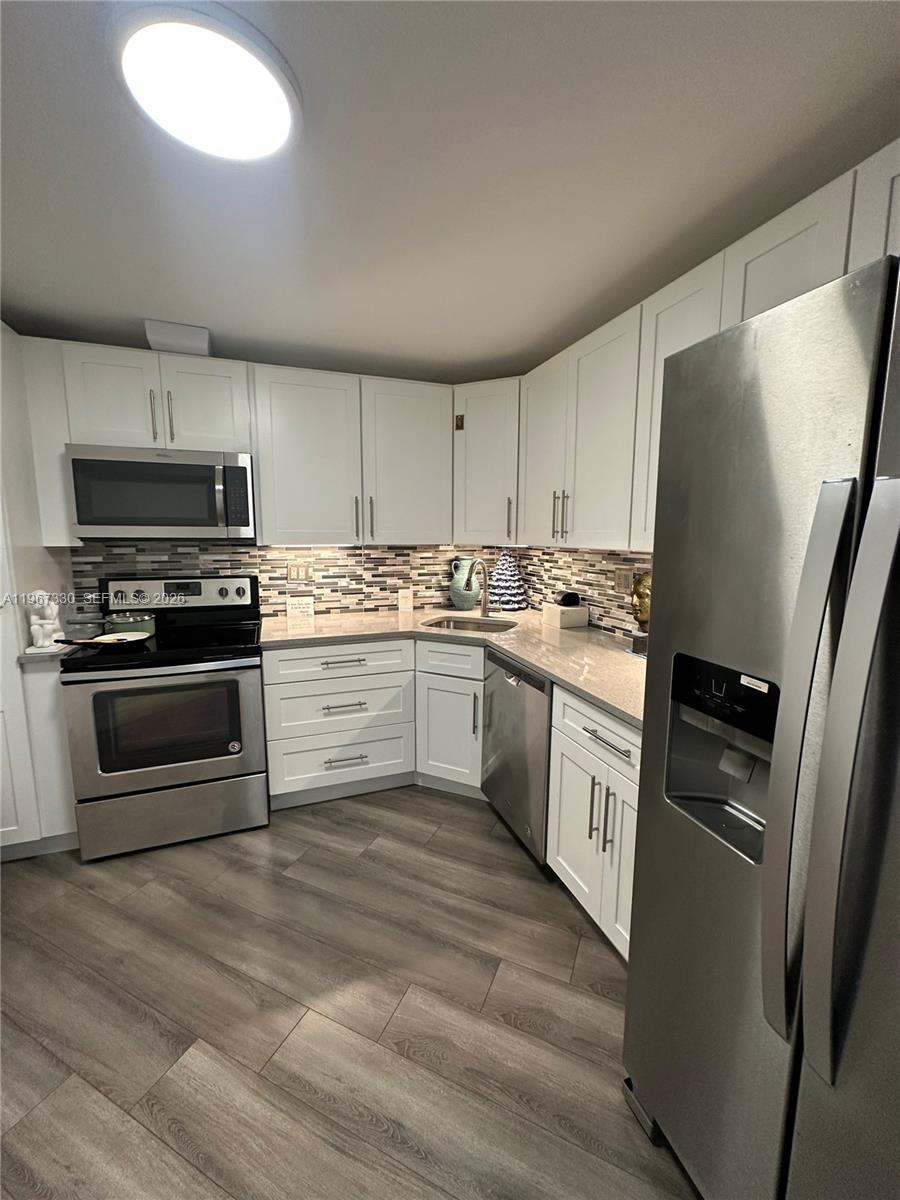 COMMODORE PLAZA CONDO - Residential