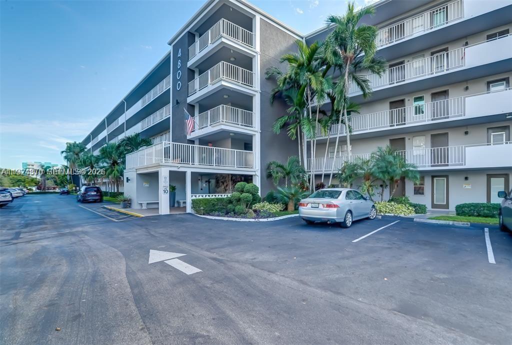ASSESSMENTS PAID IN FULL BY SELLER! FURNISHED 2 BED / 2 BATH CONDO located in the 55+ building of HILLCREST COUNTRY CLUB. This condo is located on the TOP floor, therefore no additional upstair neighbors. Kitchen is equipped with a dishwasher and has a little sitting area. Big living area that leads to the immense balcony that is also connected to the primary bedroom. Balcony is screened in. Primary bedroom has a nice walk-in closet and its own bathroom. Building does have an elevator and plenty of guest parking spots. Great ameneties that are walking distance such as gym, exercise room, etc