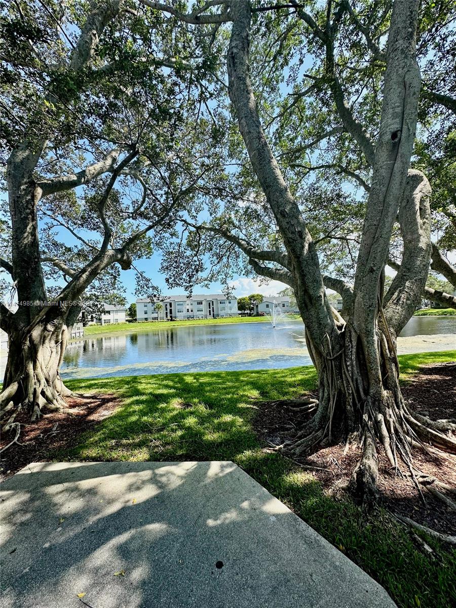 Private stairs to your own unit. Beautiful view of the lake from every room. Great location - close to I95, Palm Beach Outlets, Downtown Clematis and Rosemary Square, hospitals, restaurants, and a Publix. 2 bedroom, 1 bathroom with granite kitchen counters, breakfast area, ceramic tiles, no popcorn ceilings, and laundry inside the unit. The community is gated with a clubhouse, fitness center, pool, tennis courts, and indoor racket ball courts. The condo association requires a 650 credit score (otherwise a co-signer will be required).