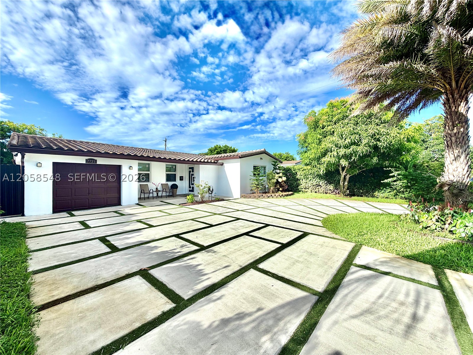 Move-in ready 3-bedroom, 2-bath pool home offering the perfect blend of comfort, quality, and outdoor living in the heart of Miramar. This well-maintained residence features impact windows and an impact front door, a durable tile roof (2018), and a A/C system (2021) for year-round comfort and peace of mind. Inside, you'll find tile flooring throughout, fresh interior paint, a bright and functional kitchen, and a convenient interior laundry room. Step outside to your private backyard oasis featuring a sparkling pool, renovated pool deck, covered porch, and an updated driveway, perfect for entertaining family and friends or simply enjoying the South Florida lifestyle. Conveniently located near parks, shopping, dining, schools, and major highways. Don't miss the opportunity to own this beautifully maintained home in one of Miramar's most established neighborhoods.
