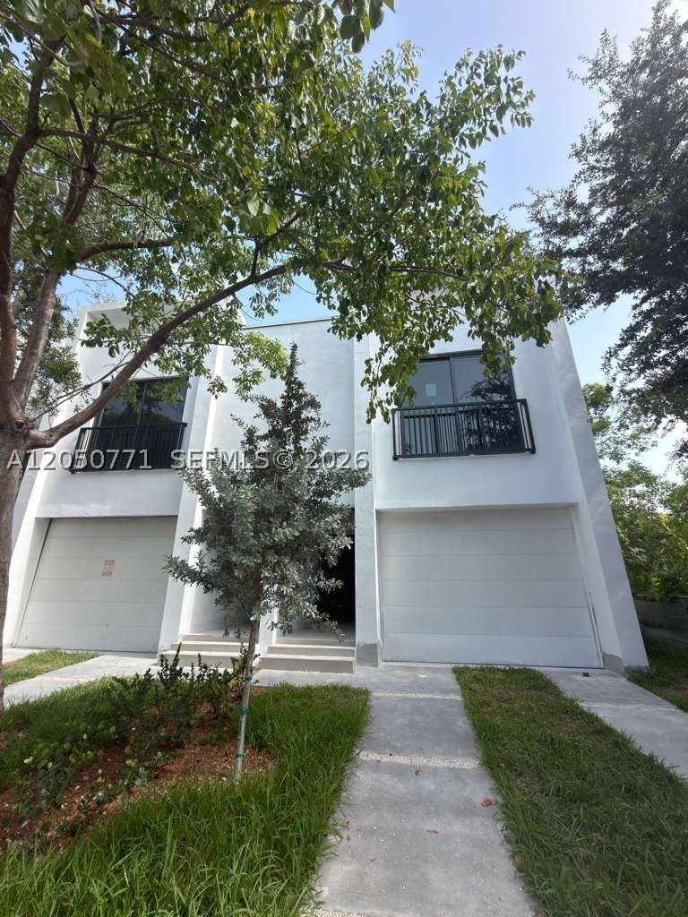 Modern duplex consisting of two units, featuring 3 bedrooms, 2.5 baths, and 2,650 sqft of living space in the desirable Windwood area of Miami. With a modern kitchen, updated appliances, spacious layout, and private pool, this property is well suited for both investment and lifestyle appeal. Its prime location offers quick access to Downtown Miami, Miami Beach, restaurants, nightlife, and all the energy Miami has to offer.