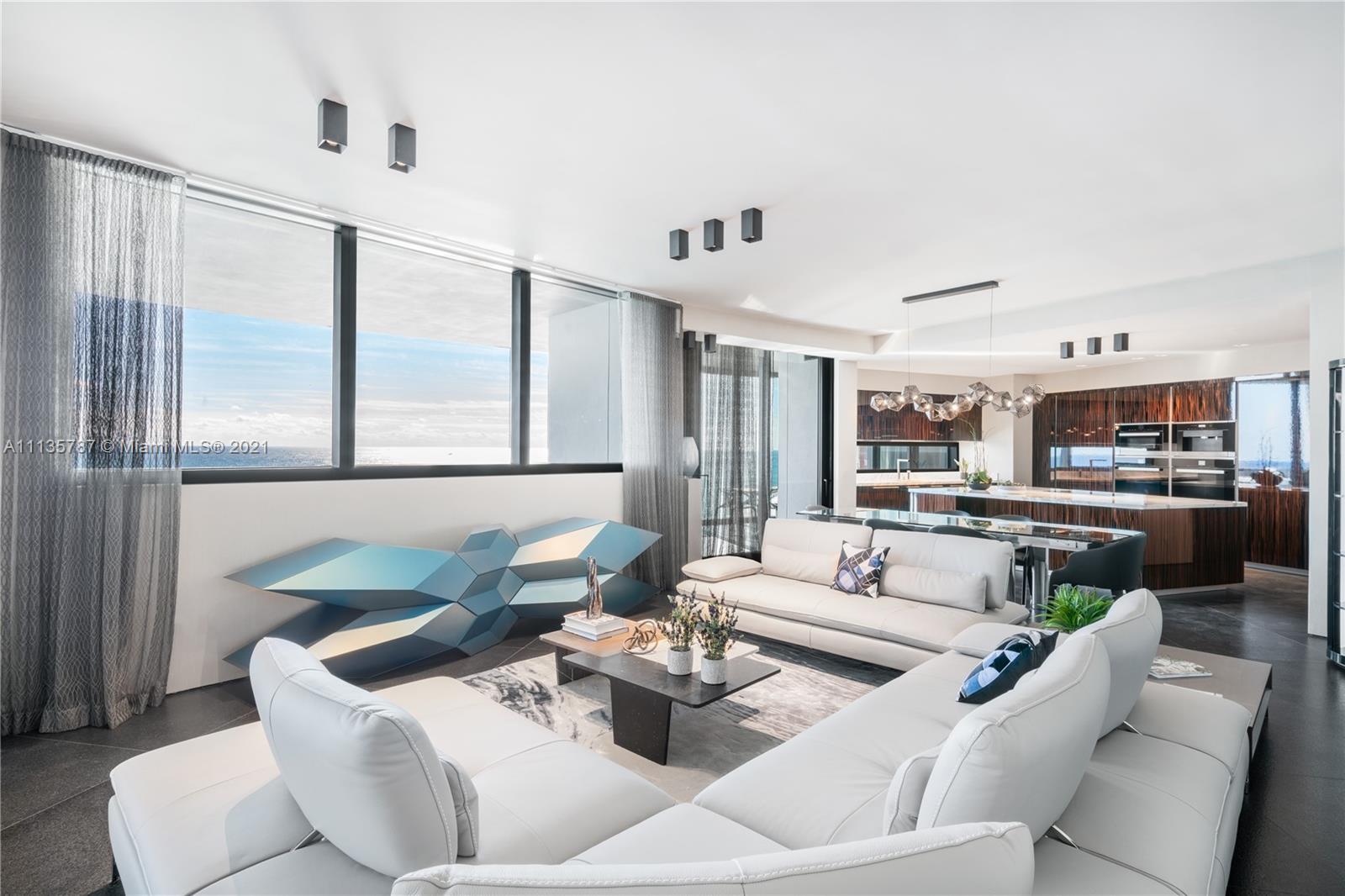 One of a kind apartment at the exclusive Porsche Design Tower, impeccably finished by Hernan Arriega and fully furnished by Roche Bobois. This spacious 3 bedroom features stunning views of the ocean, a jacuzzi on the balcony, and a 2 car garage in the living room. All the lighting inside this mansion in the sky is by Porsche Design, and the closets are by the most high end closet company in Miami, Ornare. The only building in the world that allows you to drive your car directly into your living room. Full service building complete with concierge, 24 hour valet and security, car concierge, pool, spa, oceanfront gym, yoga studio, movie theatre, party room, bar, restaurant with room service, sunset deck, viccci shower, virtual sports room, car racing simulator & the groundbreaking Dezervator.