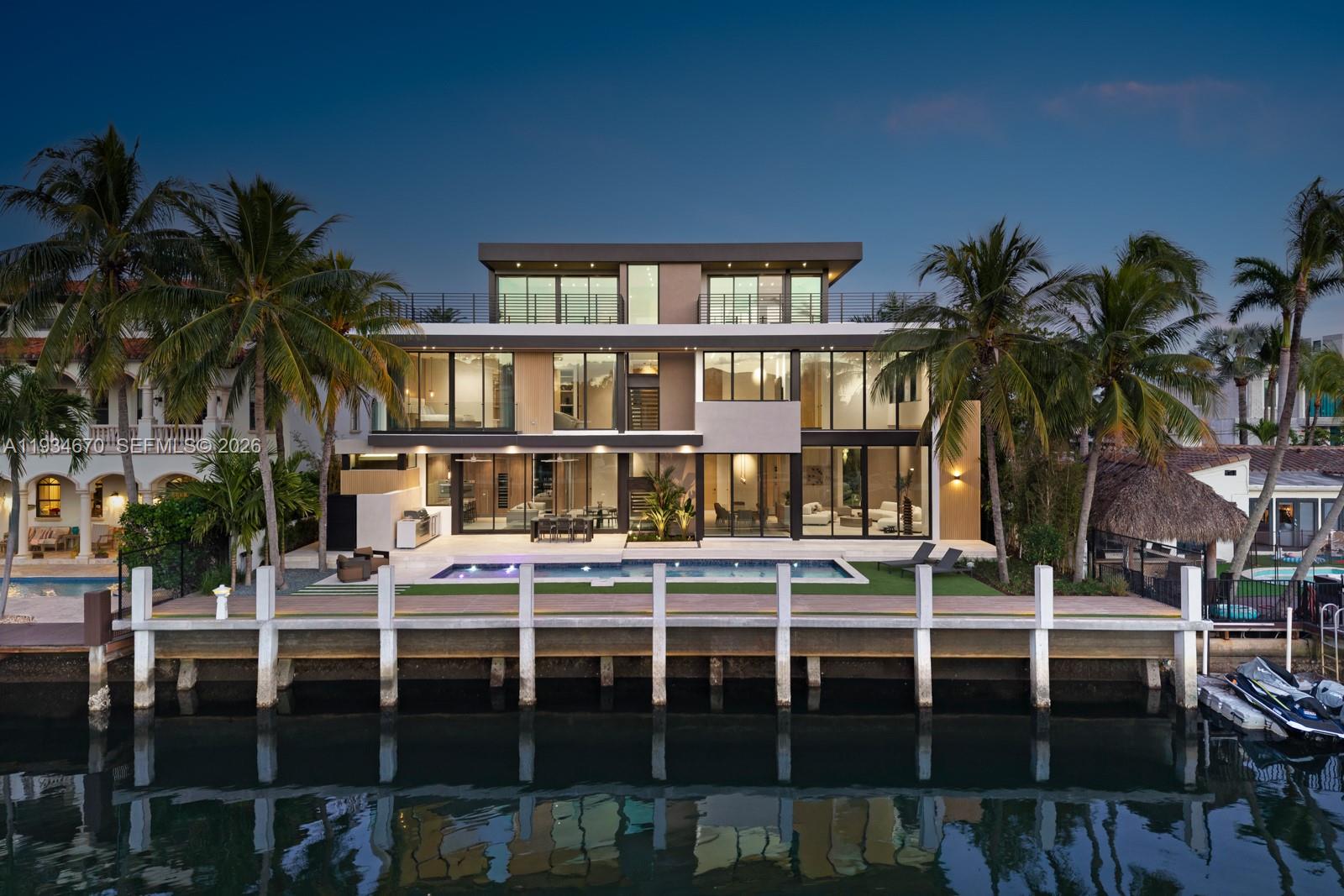 Recently repositioned to meet market, presenting a compelling opportunity to acquire a newly built Las Olas waterfront estate.

Completed in 2026, this newly built waterfront estate is a refined expression of modern luxury, thoughtfully designed across three levels to offer both elegance and comfort.

The ground floor presents a sophisticated Italian kitchen with informal dining and living area, complemented by an elegant formal dining room and a beautifully appointed salon. A private office, powder room, and guest bedroom complete this level. Expansive glass doors open from both the kitchen and salon to a gracious terrace and landscaped backyard, creating seamless indoor-outdoor living. The waterfront setting features a resort-style pool, spa, summer kitchen, and private dock with direct ocean access and no fixed bridges.

The second floor is devoted to private living and features a magnificent primary suite with an expansive walk-in closet and spa-inspired bathroom, along with three additional en-suite bedrooms. A refined family lounge connects the sleeping quarters.

The third floor is dedicated to lifestyle and entertainment, offering a private gym with rooftop terrace and hot tub on one wing, and a sophisticated media room / man cave with bar, full bathroom, and rooftop terrace on the other.

A rare opportunity to own a newly completed, turnkey waterfront residence combining architectural distinction, premium finishes, and an exceptional boating lifestyle.