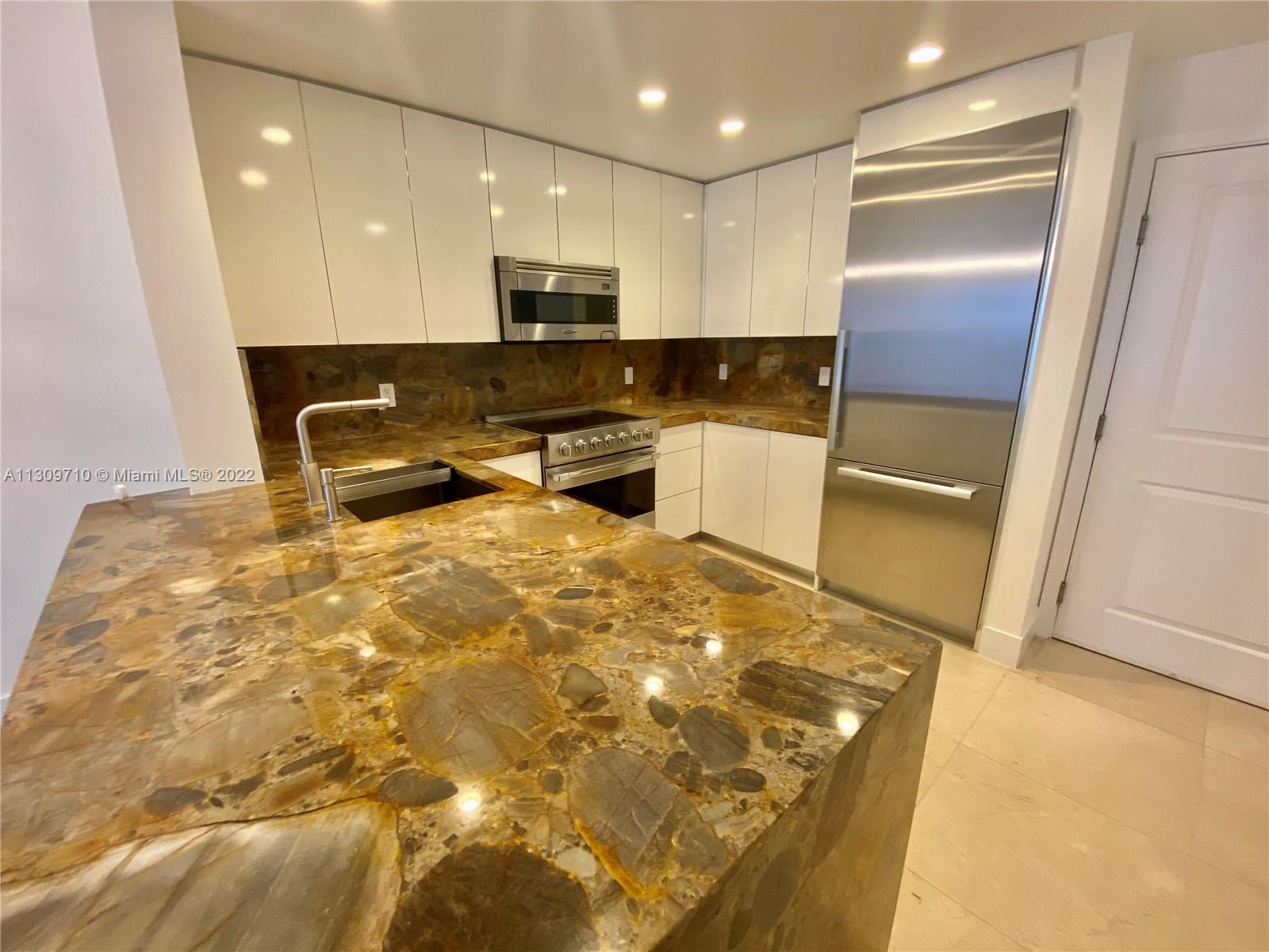 TEN ARAGON CONDO - Residential Lease