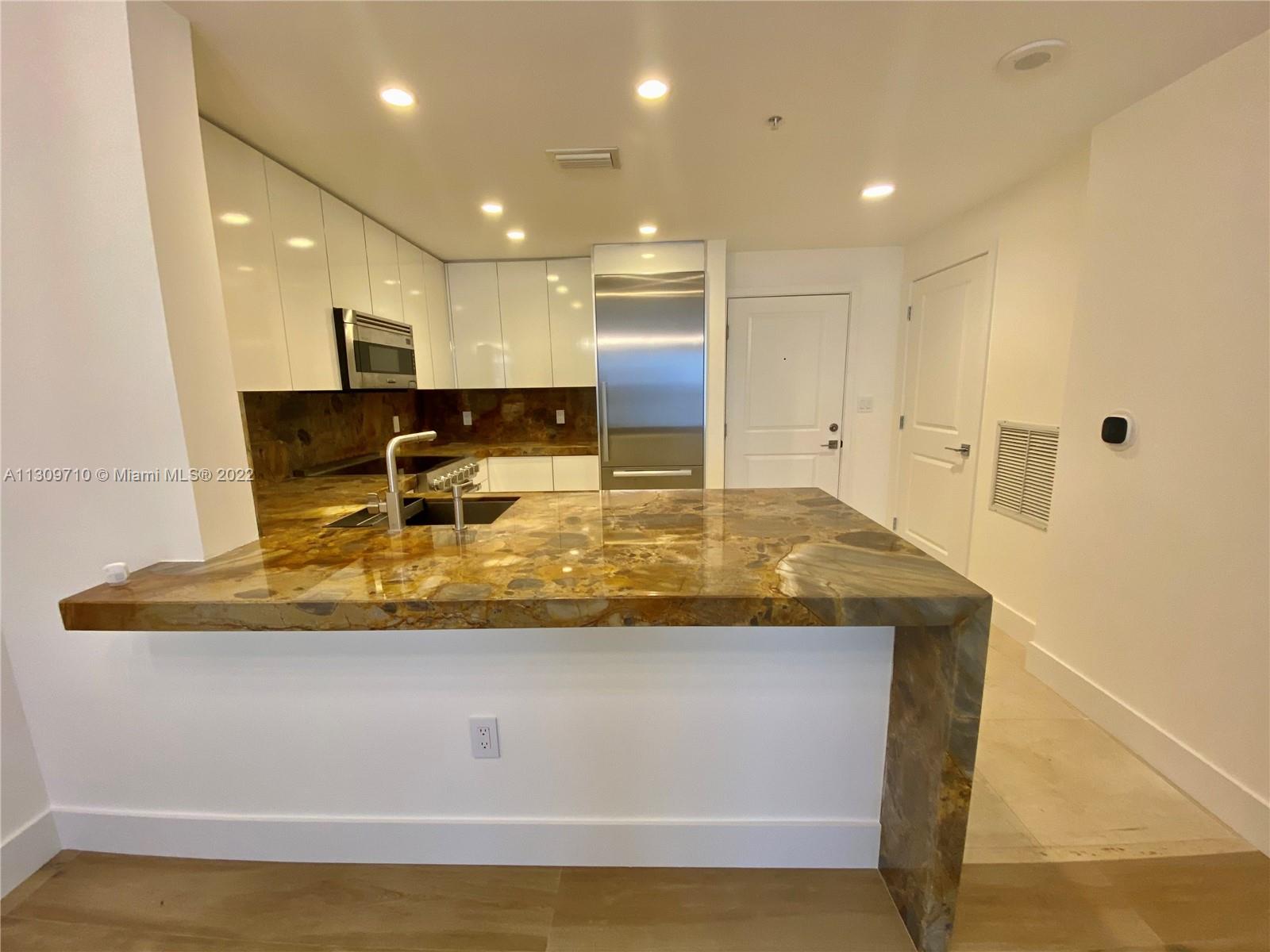 TEN ARAGON CONDO - Residential Lease