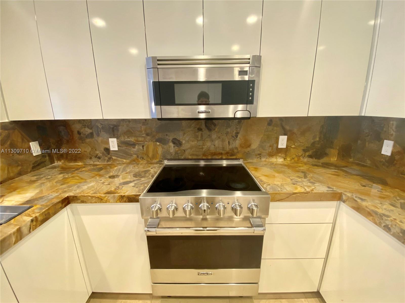 TEN ARAGON CONDO - Residential Lease