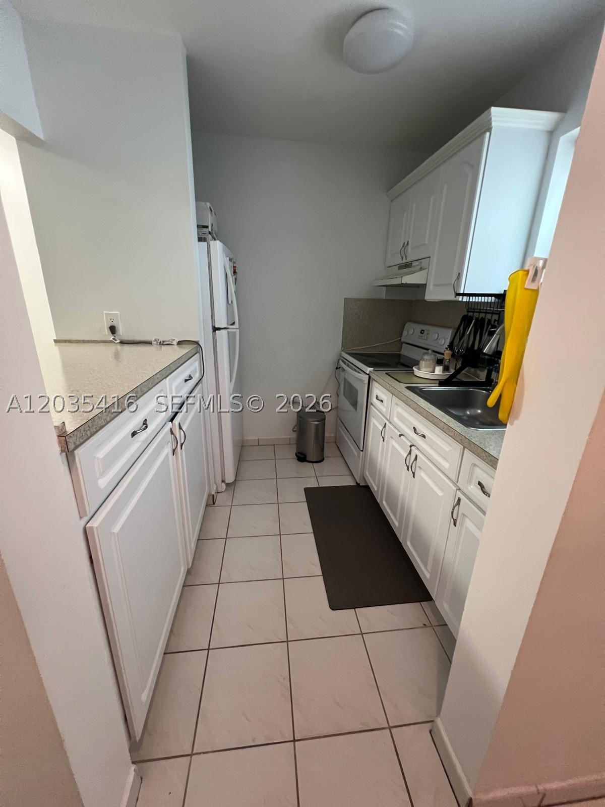 Welcome to your new home in North Miami! This charming condo offers the perfect blend of comfort and convenience. With 1 bedroom, 1 bathroom, and a 1 car garage, this 615 sq ft space is efficiently designed for modern living. The central A/C and heating system ensure year-round comfort, while the community amenities, including a swimming pool and shared common areas, provide the perfect setting for relaxation and socializing. Located in the Wendover Condo community, built in 1973, this condo boasts an open living and dining area design flooded with natural light. 
The gated building offers peace of mind with assigned parking and controlled access for added security. Whether you're looking for a cozy retreat or a place to entertain friends and family, this condo has it all. Don't miss out on the opportunity to make this your new home sweet home in North Miami! Ok to lease.