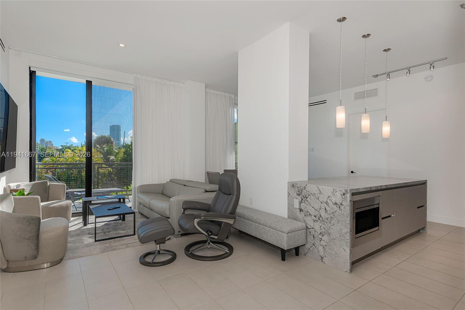Modern South Beach living in one of the area’s few newer buildings — priced under $900/SF.
This 2 Bed + Den / 2.5 Bath residence is sun-filled, move-in ready, and finished with sleek contemporary design. The den fits a queen bed, ideal as a guest room or home office.

Owned since 2022 and used only seasonally, the unit is in like-new condition and has never been rented. One of the few buildings in Miami Beach offering a full amenity package, including garage parking, gym, and pool.

Features include an Italian-designed kitchen with Smart Samsung appliances, frameless rain-shower bathrooms, walk-in closets, and in-unit washer/dryer. Includes 2 assigned parking spaces, a rare find in South Beach.

Ideally located near Lincoln Road and Flamingo Park, just minutes to the ocean, Sunset Harbor, top dining, nightlife, and premier fitness clubs like Anatomy and Equinox.

Newer construction. Prime location. Exceptional value.