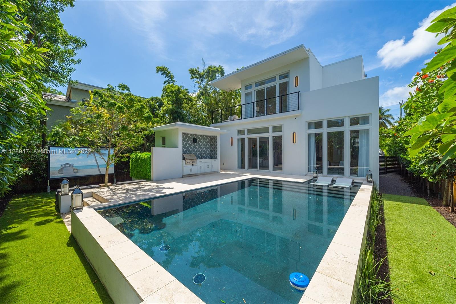 BRAND NEW PRIVATE + GATED, TWO-STORY LUXURY RESIDENCE FINISHED TO PERFECTION! HOME IS IN PRIME LOCATION + WALKING DISTANCE TO OCEAN. THIS CONTEMPORARY RESIDENCE HAS 5 BEDROOMS [INCLUDES STAFF], 5.5 BATHROOMS, HEATED SWIMMING POOL WITH OUTDOOR MOVIE THEATER, OUTDOOR KITCHEN + BBQ WITH A FULL CABANA BATH, INDOOR/OUTDOOR LIVING SPACES WITH WRAPAROUND BALCONIES + 400 SF PRIVATE MASTER BALCONY. FEATURES INCLUDE IMPACT WINDOWS + DOORS, CUSTOM BLINDS + SHADES, BRILLIANT SMART HOME, SECURITY CAMERAS, GOURMET/KOSHER NATURAL GAS CHEF'S KITCHEN BY ITALKRAFT WITH MIELE, WOLF, + SUBZERO APPLIANCES