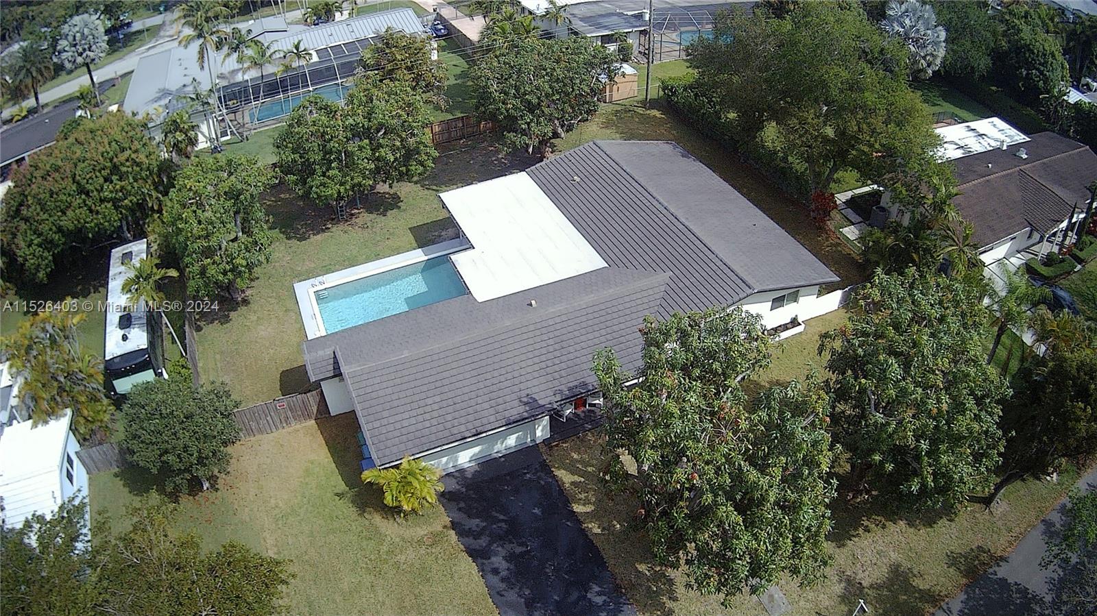 Rarely Available Mangowood Gem! This 3 bedroom, 2 bath home has been completely remodeled with decorator touches and is located on one of the prettiest streets in the neighborhood! The spacious open floor plan is light and bright with impact windows and doors, new roof, new plumbing, new Spanish porcelain floors, bathrooms, and kitchen. The pool patio includes a deep overhang perfect for outdoor enjoyment and entertainment. Move right into this special Mangowood home steps away from Coral Reef Park, Deering Estate, and top public/private schools to start enjoying this sought-after neighborhood & South Florida living at its best! Total SqFt 2,851 as per tax roll. "A mandatory $100 monthly fee for the security system will be added to the rent". Available April 1, 2024