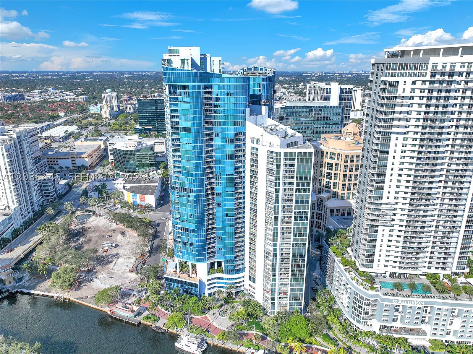 Elegant & modern with a full renovation best describes this showstopping 2/2.5 Chelsea in iconic Las Olas River House. The building offers a vibrant upscale lifestyle on the dynamic New River, celebrated Riverwalk & famous Las Olas Blvd. This sophisticated condo has modern top tier elements: contemporary kitchen & bathroom cabinetry, porcelain floors, granite counter tops, LED lighting, spa like bathrooms with spectacular pool & river views. Semi-private renovated foyer & highly sought after floorplan. Round radius floor to ceiling glass in every room & large terrace. Providing luxury urban life at its best! Grand lobby with Koi pond, world class fitness center, magnificent tropical pool deck, Hyatt Hotel, Eddie V's, Moxies & Publix just steps away. Financially secure building just completing over 26M in renovations. With 5M pool renovation well underway & completion Fall '26. City just completed 15M renovation to Huizenga Park & will open Sweetwater's Restaurant in Fall '26. Never a better time to invest in River House!