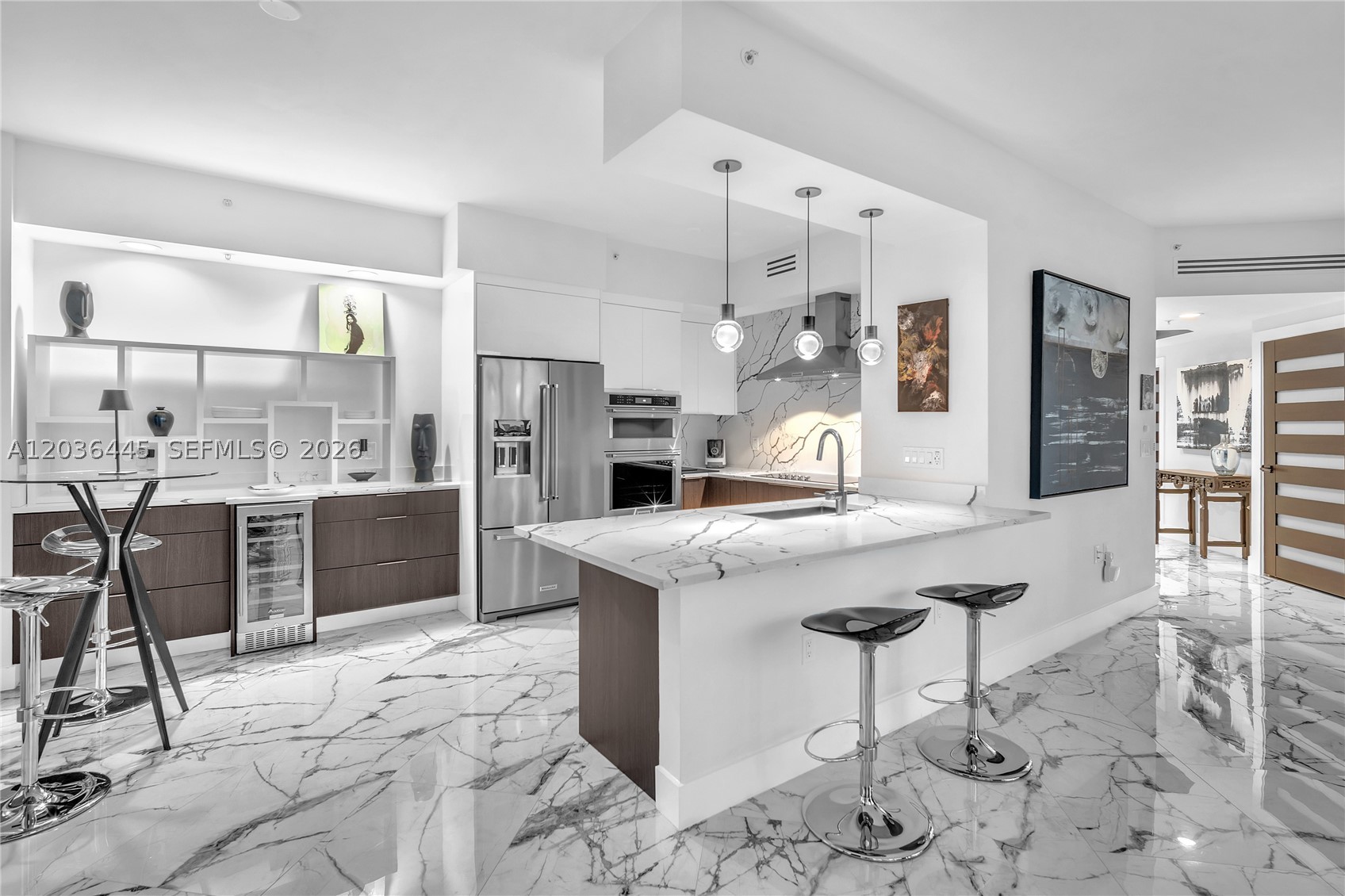 Elegant & modern with a full renovation best describes this showstopping 2/2.5 Chelsea in iconic Las Olas River House. The building offers a vibrant upscale lifestyle on the dynamic New River, celebrated Riverwalk & famous Las Olas Blvd. This sophisticated condo has modern top tier elements: contemporary kitchen & bathroom cabinetry, porcelain floors, granite counter tops, LED lighting, spa like bathrooms with spectacular pool & river views. Semi-private renovated foyer & highly sought after floorplan. Round radius floor to ceiling glass in every room & large terrace. Providing luxury urban life at its best! Grand lobby with Koi pond, world class fitness center, magnificent tropical pool deck, Hyatt Hotel, Eddie V's, Moxies & Publix just steps away. Financially secure building just completing over 26M in renovations. With 5M pool renovation well underway & completion Fall '26. City just completed 15M renovation to Huizenga Park & will open Sweetwater's Restaurant in Fall '26. Never a better time to invest in River House!