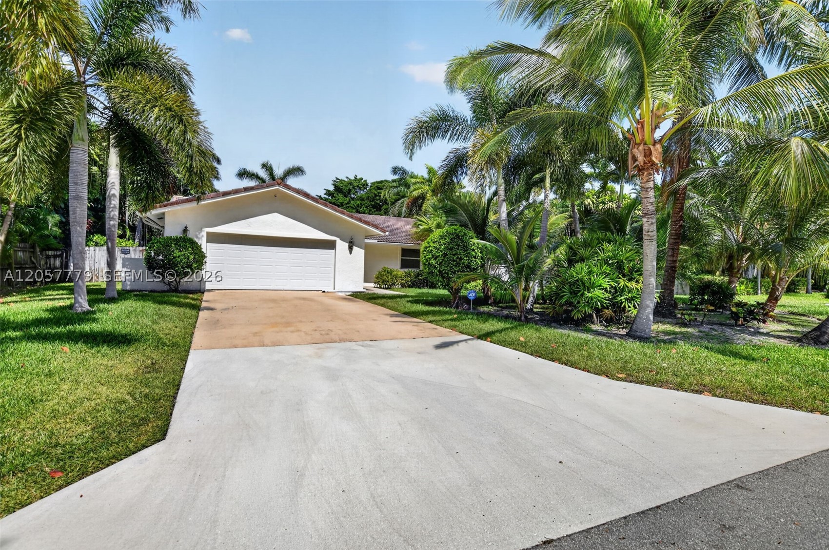 Location, location, location! Do not miss the opportunity to own this beautiful single-family home located east of Boca Raton, featuring A+ rated schools.
This well-maintained 3-bedroom, 2-bathroom home offers granite countertops, stainless steel appliances, impact doors and windows, and a 2-car garage. It sits on an extra-large lot of almost 12,000 square feet, providing perfect space to park a boat or an RV. The property also features a beautiful pool with a roofed patio perfect for family gatherings, all surrounded by a private oasis of palms, beautiful flowers, and professional landscaping. A must See!!!Make your appointment!!!