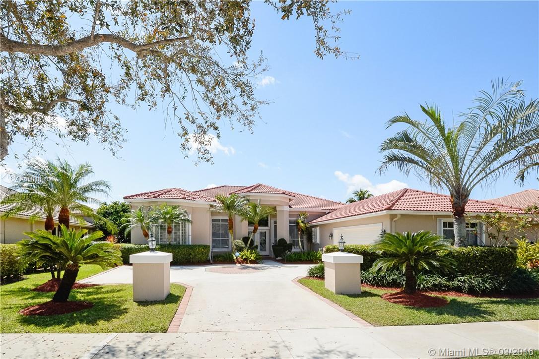 THIS HOME SHOWS LIKE A MODEL. SPECTACULAR VIEWS OF THE POOL AND LAKE THE MINUTE YOU STEP INTO THIS HOME. 4 BEDROOMS ON A SPLIT FLOOR PLAN. 3 BATHROOMS INCLUDING A CABANA AND JACK AND JILL BATHROOM. UPDATED KITCHEN WITH WOOD CABINETS, GRANITE COUNTER TOPS AND STAINLESS STEEL APPLIANCES. BREAKFAST AREA. FORMAL DINING ROOM. LARGE MASTER SUITE WITH HIGH CEILINGS. UPDATED MASTERBATH WITH ROMAN TUB AND GRANITE COUNTERS. 2 CAR GARAGE WITH A SIDE ENTRY. HEATED POOL. THE PROPERTY IS COMPLETELY FENCED.