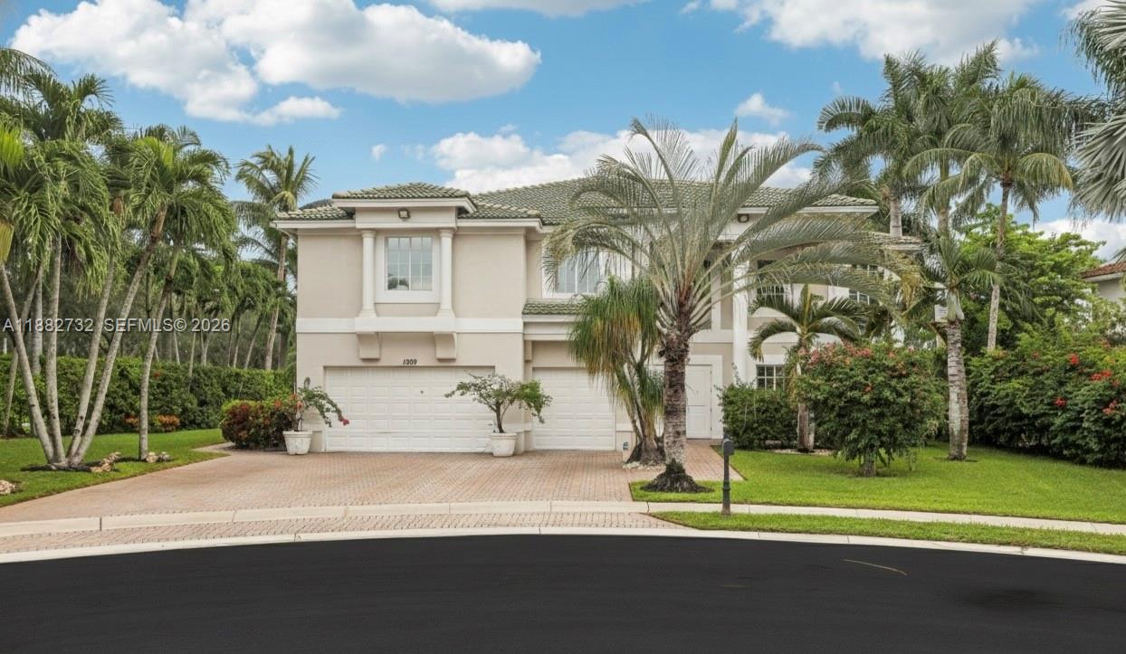 Welcome to 11759 Paradise Cove Lane—a private lakefront home in the gated community of Isles at Wellington. Set on an oversized cul-de-sac lot with only one neighboring home, this residence offers exceptional privacy, lush tropical landscaping, and an incredible water view.

Inside, you’ll find a bright, open layout with soaring ceilings, abundant natural light, and spacious living areas ideal for entertaining. Recent improvements include two newer A/C systems, fresh interior paint, updated lighting, newer upstairs carpeting, and a new refrigerator. A garage conversion adds a flexible 7th bedroom—perfect for a guest suite, home office, gym, or multigenerational living.

Step onto the private balcony off the primary suite and enjoy tranquil lake views. Outside, there is ample room to add a pool and create your own outdoor oasis. Enjoy the peace of a gated community with resort-style amenities including a clubhouse, community pool, tennis, pickleball, fitness center, and spa/hot tub. HOA includes cable, internet, and alarm monitoring. Ideally located in central Wellington near equestrian venues, top-rated schools, dining, shopping, and major roadways—offering the best of South Florida luxury living.