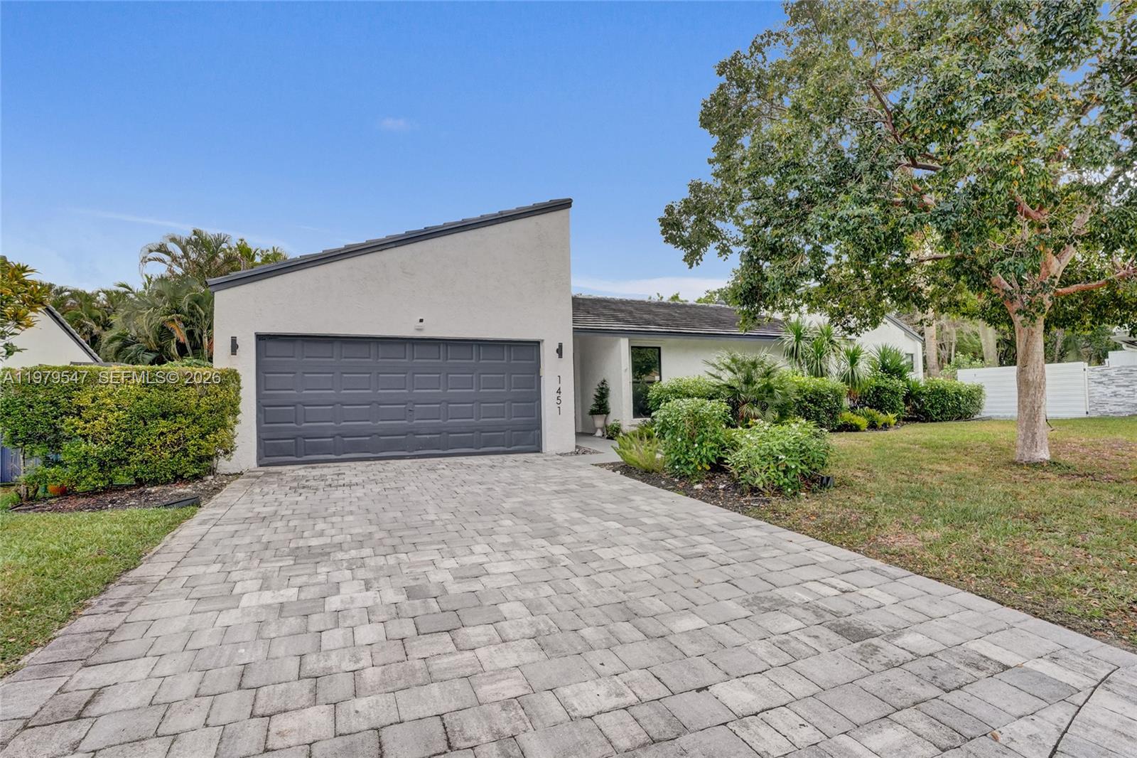 Beautiful 4BR/2.5BA pool home on a quiet cul-de-sac in the heart of Coral Springs. Offering over 2,300 SF of living space, this home features a desirable split floor plan with the primary suite privately set apart from the secondary bedrooms. Bright and spacious living areas include two separate living spaces, an open kitchen, porcelain tile flooring, and a layout that feels both functional and inviting. Step outside to enjoy a large backyard with pool, peaceful canal views, and space to relax or entertain. The 2-car garage is currently set up with additional flex space, ideal for a home gym or extra storage. Conveniently located near top-rated schools, parks, shopping, and dining, this home offers the privacy, space, and neighborhood setting that buyers are looking for. No HOA.