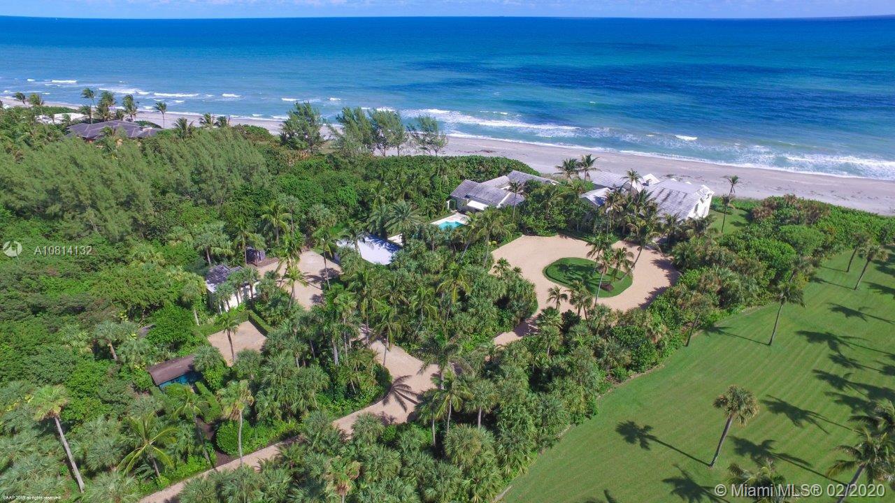 Property spans nearly 3 acres with over 276 feet of direct ocean frontage. Built in 1936, expanded in 1948 and again throughout the years. Over 7000 sqft main house with 8 bedrooms and 9.2 bathrooms. Charming 2 bedroom, 2 bathroom oceanfront pied-a-terre that leads to pool house with full bar and dressing rooms. 13499 sqft permitted floor area for new construction.