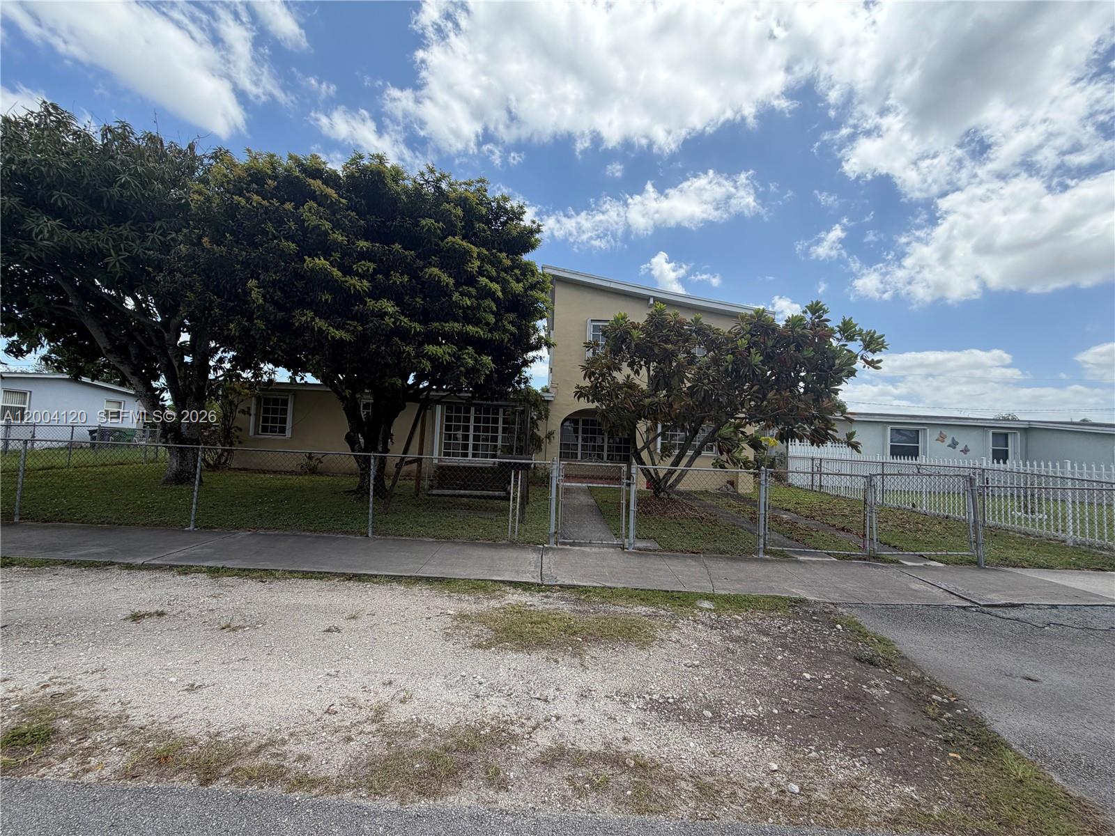 *LOCATION LOCATION Bird Road Frontage* This two-story home features 6-bedrooms and 3-bathrooms.  Close to the Turnpike, Walking Distance to Elementary School, Restaurants, and Supermarkets.  Ideal for investors or buyers seeking a project house or other permitted uses. Commercial properties are located along the same street. Buyer to verify zoning, land use, and development options with the city or during Due Diligence Period.