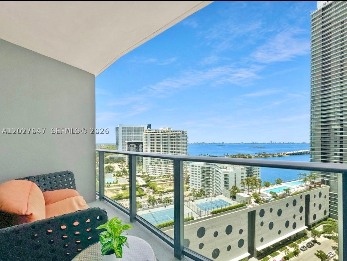 Spectacular waterfront 1BR/2BA unit with breathtaking bay views, available furnished or unfurnished. Features high-end Bosch appliances, modern kitchen with premium finishes, smart thermostats, energy-efficient features, and wood laminate flooring throughout. Enjoy world-class amenities including 2 pools, Jacuzzi, tennis and pickleball courts, gym, spa, dock, and waterfront restaurant. Prime location with easy access to major highways, just 7 minutes to Downtown Miami/Brickell, and close to Miami Beach, Design District, Midtown, and Adrienne Arsht Center. Ready to move in July 1.