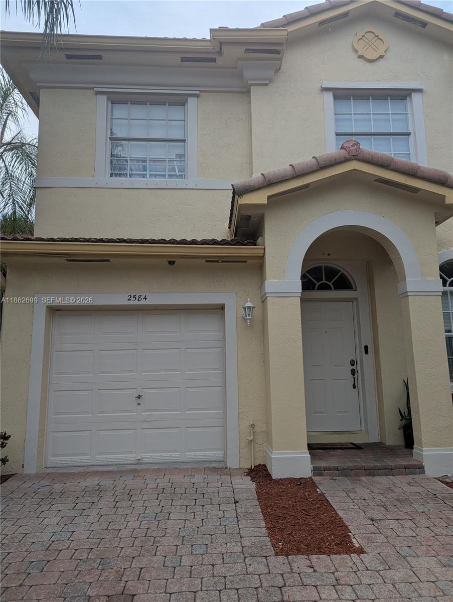 LOVELY 4/3.5 TOWNHOME WITH ONE CAR GARAGE. SPACIOUS FLOORPLAN. LARGE MASTER BEDROOM WITH WALK IN CLOSET. FORMAL LIVING ROOM AND FAMILY ROOM. NEW WOOD FLOORS. GATED COMMUNITY WITH 24 HR SECURITY, COMMUNITY POOL, AND CLUBHOUSE. MUST SEE!!!