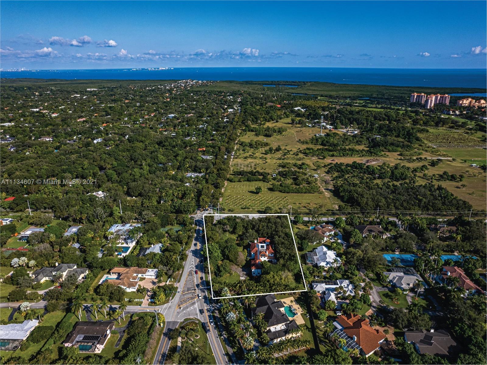 Expansive 2.4 acre corner lot that HAS POTENTIAL TO BE SUBDIVIDED. This unique gated estate features 8,252SF liv w/ 9 BED/9.5 BTH, new roof with solar panels and more. 1st floor features family room w/ bar & full underground wine cellar for quality entertainment. Take elevator or stairs to 2nd floor, offering 6 BEDs w/ updated Italian porcelain floors. Backyard boasts 2 BBQs & heated saltwater pool. House features 2 addtnl guest suites, 3 car garages, generator, 4 fireplaces, new roof & 24H security cameras throughout. Front doors open to grand foyer w/ 30FT ceilings,1st floor offers marble flooring throughout formal living & dining rooms + office & updated kitchen w/ subzero appliances. Conveniently located next to Miami's best private schools.