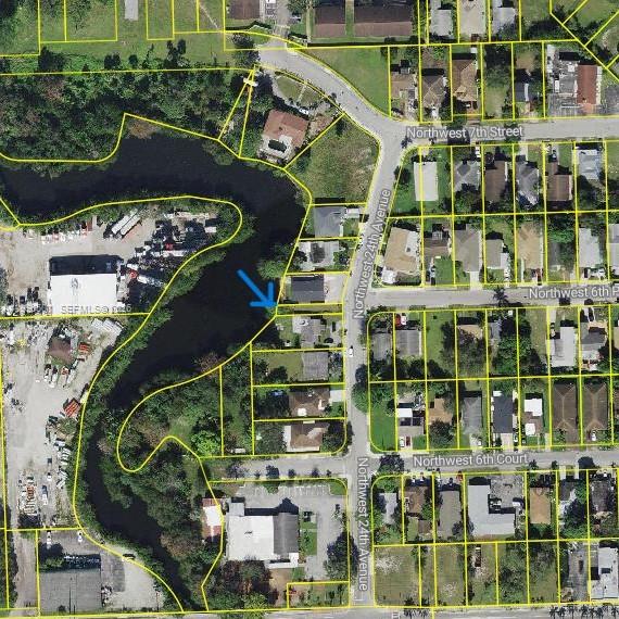 Price improvement on this piece of South Florida paradise! This vacant lot (zoned RS-6) offers the perfect space for the Environmentally Conscious Adventurer to enjoy a peaceful retreat. This unique green space includes a private access point to the New Fork New River where you can fish, kayak or just enjoy the waterway views while watching the sun set. You could also plant a tree or a community garden. What would you do? This property is located close to shopping, the beach, major highways, the airport, cultural arts centers and more. 

(Property at the intercept of NW 6th Place and NW 24 Ave)