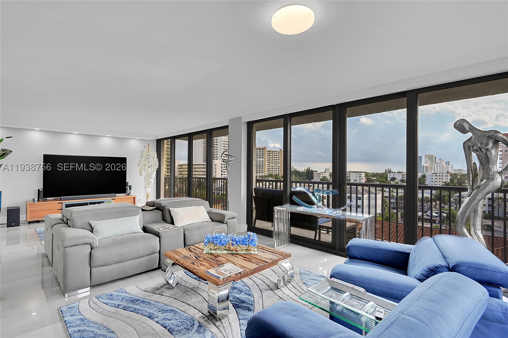 WELCOME TO THIS COASTAL CONTEMPORARY WATERFRONT RETREAT WITH ABUNDANT NATURAL LIGHT WITH OCEAN, INTERCOASTAL and SUNSET VIEWS! Fully renovated 2BD/2BA + DEN corner residence in Hallandale Beach featuring direct beach access, this 1,360 SF home offers magnificent water views with floor-to-ceiling ALL NEW HURRICANE IMPACT WINDOWS AND DOORS and remote control sun screens throughout the unit, wrap around balcony, modern open concept kitchen with quartz countertop island and custom cabinetry opening to a very spacious living room and dining room, Porcelain floors, custom closets and renovated with high end quality and finishes. Enjoy a tranquil coastal Lifestyle in this boutique style building with only 10 residents per floor. 5 Star amenities include :24-hour security, tennis courts, heated pool, fitness center, sauna, billiard room and renovated lobby. Building has completed the 50-year re-certification and has been newly painted with the Lowest HOA Fees on South Ocean Drive at $830.00 per month. Financially secure building and no assessments. PRIME LOCATION BORDERING GOLDEN BEACH, CLOSE TO SHOPPING, THE AVENTURA MALL, BAL HARBOUR SHOPS, HOLLYWOOD FT. LAUDERDALE AIRPORT & LUXURY RESTAURANTS.
    **A-1 MOVE IN CONDITION FULLY FURNISHED RESIDENCE!!! ** THIS CONDO OFFERS IT ALL !