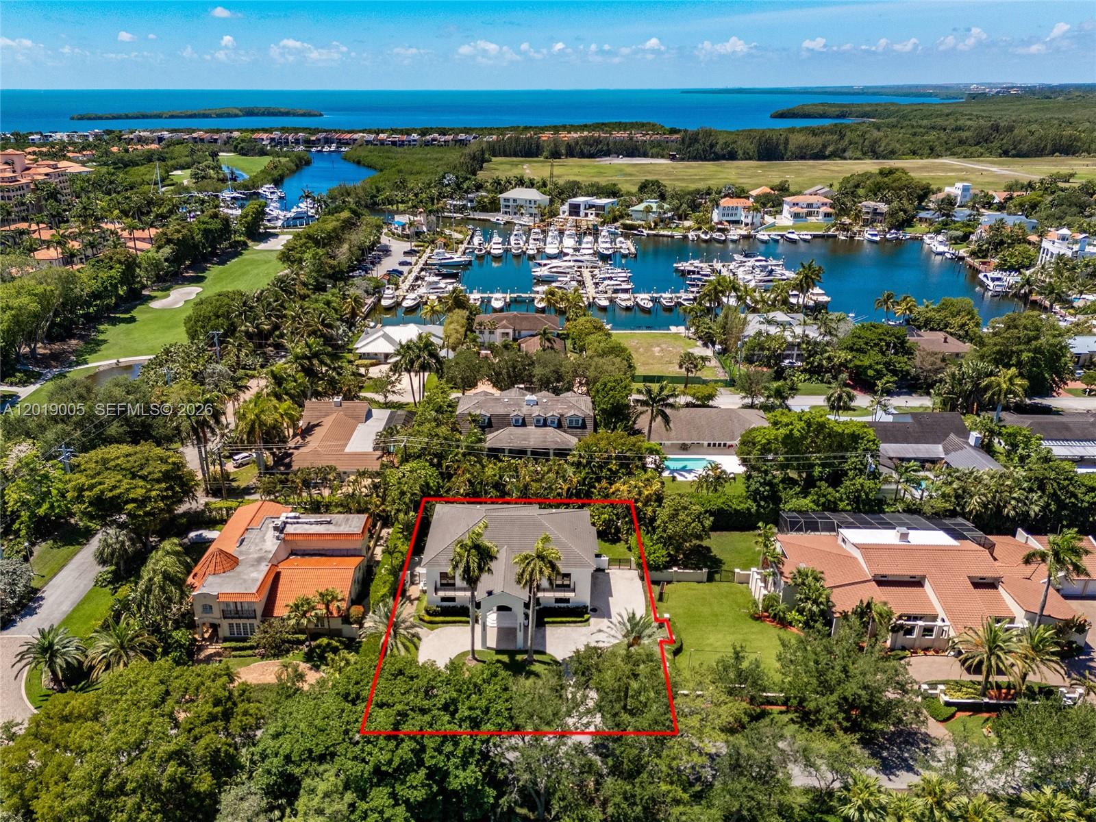 Premier location in the exclusive, guard-gated waterfront Kings Bay community of only 150 homes in Coral Gables. This modern 2 story 5 bedroom 4 1/2 bath residence has been completely renovated and offers a unique design for multigenerational living featuring 3 bedrooms 2 1/2 baths upstairs and 2 bedrooms and 2 bathrooms downstairs with separate chef's kitchens. Other features include a grand porte-cochere entrance, foyer with double height ceilings, an open floor plans on 1st and 2nd floors great for entertaining. Extremely bright throughout with a multitude of panoramic impact windows overlooking the Deering Bay Golf course, pool and private backyard. A boaters paradise with a private marina for residents with deep water access to Biscayne Bay.