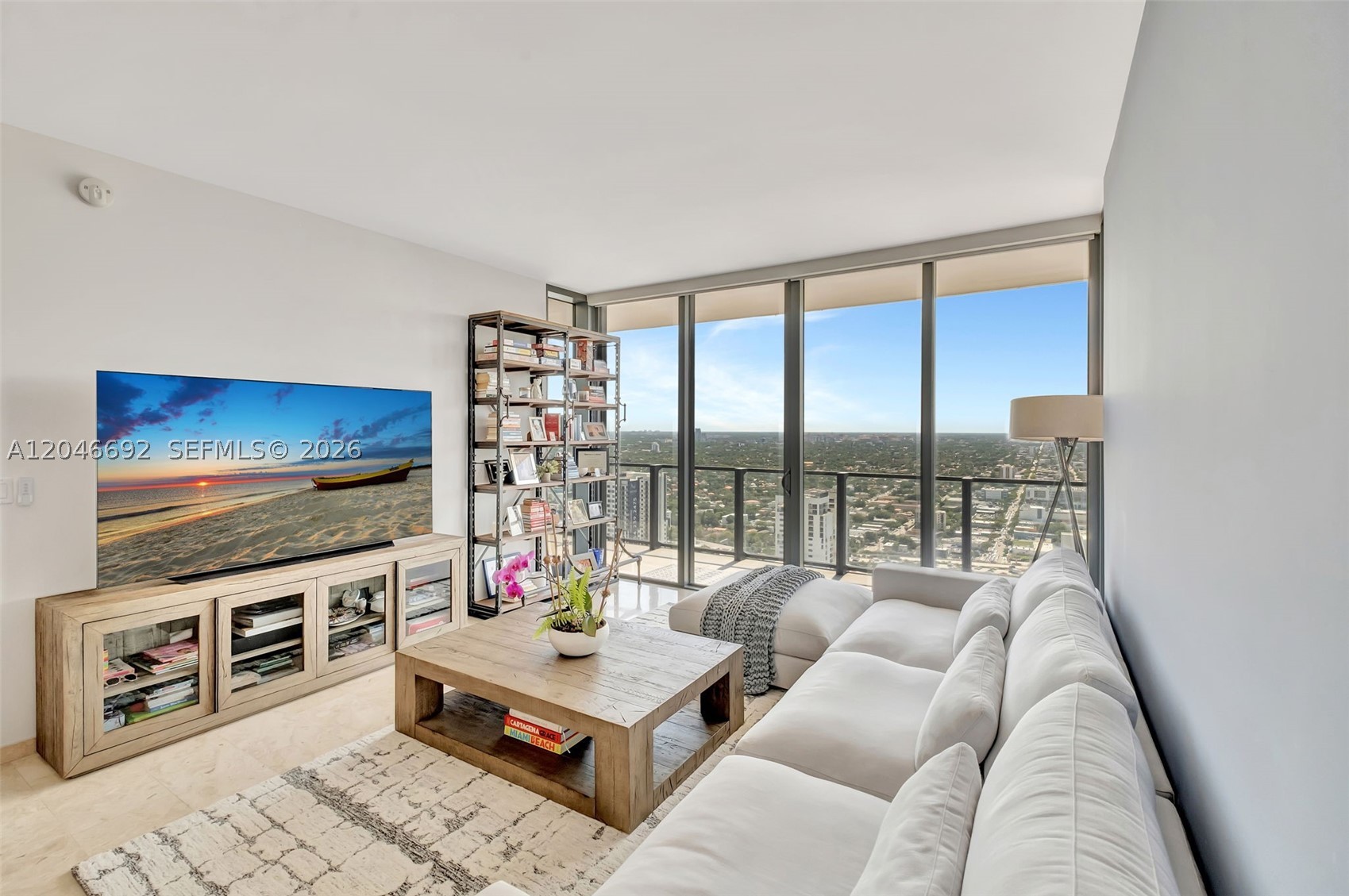 Sunsets from your western-facing balcony are unbeatable. Unobstructed Biscayne Bay views that never get old. This high-floor residence in Rise, Brickell City Centre sits perfectly above the street noise while staying steps from everything. The 04 line with expanded balcony and den gives you real flexibility. The master features a spa-like bathroom and walk-in closet. The second bedroom is spacious. Floor-to-ceiling windows flood the open-concept kitchen with light, complete with wine cooler. Abundant storage throughout. The views are the real show-stopper. Electric blackout shades let you control the moment. Location is everything. Direct access to nearly an acre of resort-style amenities: 24-hour concierge and doorman, heated pool, state-of-the-art fitness center with trainer, spa, Hammam, sauna, steam room, theater, beauty salon, resident café, kids indoor/outdoor rooms, jogging track, tropical gardens, and BBQ areas. Positioned atop Brickell City Centre, steps from Miami's best shopping and dining. High-floor living without the noise. Unobstructed views, peaceful living, and urban convenience.