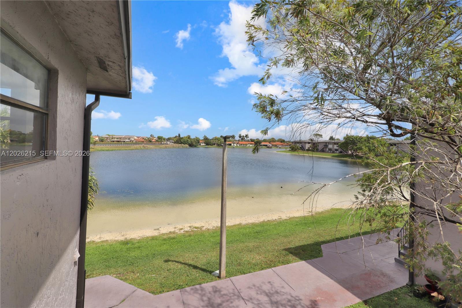 Rare opportunity to rent a waterfront 2-bedroom, 2-bath condo in Playa Lago with direct lake views. Enjoy peaceful water views from your living space in one of the community’s best locations. Bright and well-maintained unit with in-unit washer/dryer, spacious layout, and low monthly HOA. Excellent for primary residence or investment. Conveniently located near shopping, dining, FIU, and major expressways. Move-in ready and competitively priced for today’s market. Best-priced lake-view unit currently available in Playa Lago.