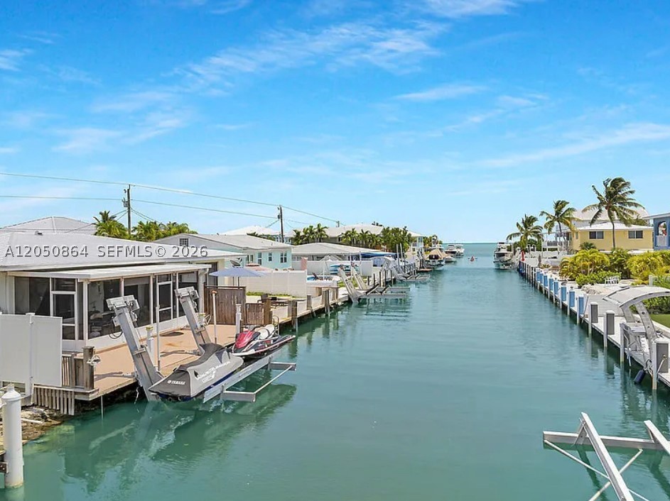 Waterfront Paradise with Saltwater Canal & Quick Ocean Access
Experience the best of coastal living in this exceptional waterfront property, perfectly situated on a deep saltwater canal with quick, no-bridge access to the open ocean. Whether you're an avid boater, fisherman, or simply love life on the water, this home offers the ideal setting for your waterfront lifestyle.
Step outside to your private dock, ready to accommodate your boat for effortless days on the water. Enjoy peaceful canal views, breathtaking sunsets, and the convenience of being just minutes from the ocean.
Inside, you'll find a bright and inviting living space designed for both comfort and entertaining. Large windows and open living areas showcase the beautiful waterfront setting, while spacious indoor and outdoor spaces provide plenty of room to relax with family and friends.


*** BOAT LIFT HAS BEEN REMOVED AS OF THIS POST ***