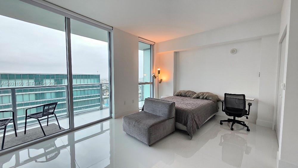 Remodeled & FURNISHED studio for rent at Millecento. This unit is on the 41st floor, offering privacy and clear views of the sunset, west Miami, and the Atlantic Ocean. The unit has a queen-sized bed, a breakfast table, a TV, and a small desk with a washer/dryer. The unit has white porcelain floors and is in excellent condition. One parking space included. Millecento Amenities: rooftop, 9th floor pool, large fitness area, game room, theater room, business center & more. **Available Now** It can be rented Long or Short Term.