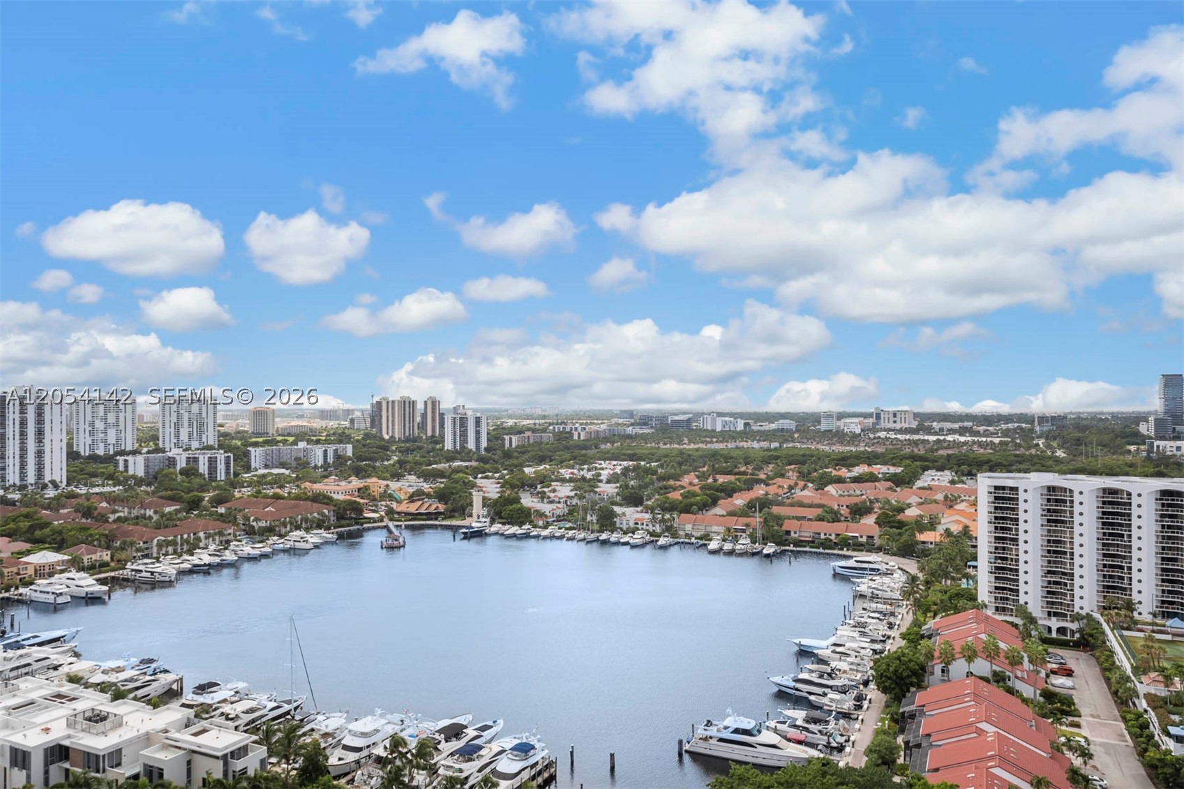 IMMACULATE and ready for it's new owner..RARE CHANCE FOR IMMEDIATE OCCUPANCY...IMMACULATE 2-bedroom plus den, offering a bright, clean and inviting atmosphere..ideal for home office space or relaxation. Marina and intracoastal views. PRIDE OF OWNERSHIP IS EVIDENT THOUGHOUT... AMAZING CLOSET SPACE... SELLER IS MOVING THIS WEEK - NEW LOBBY and NO ASSESSMENTS!!! Great closets! Walk to Waterways and Marina. Wonderful amenities including fantastic full service gym & spa...known for best classes in Aventura, cafe, 3 pools, 4 tennis courts, concierge, valet and much more! Near great restaurants, shopping, beaches and airports. EZ TO SHOW