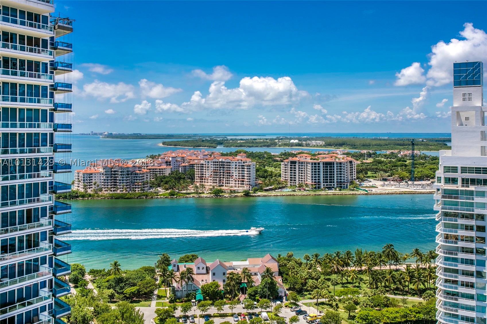 This spacious corner residence at the Continuum features fine hardwood floors, open living & dining areas, a split bedroom layout & 4 private balconies with amazing ocean, Fisher Island, Virginia Key & city views. Open kitchen sports top Miele appliances, granite counters, polished wood cabinetry. Master suite w/walk-in closet, 2 balconies w/ocean & city views, master bath w/sunken tub. Continuum 5-Star amenities include 24 hour Security/Valet, 3 Tennis Courts, 23,000SF Sporting Club & Spa. Monthly main fee $1,595.09 and $1,371.88 ( master association)