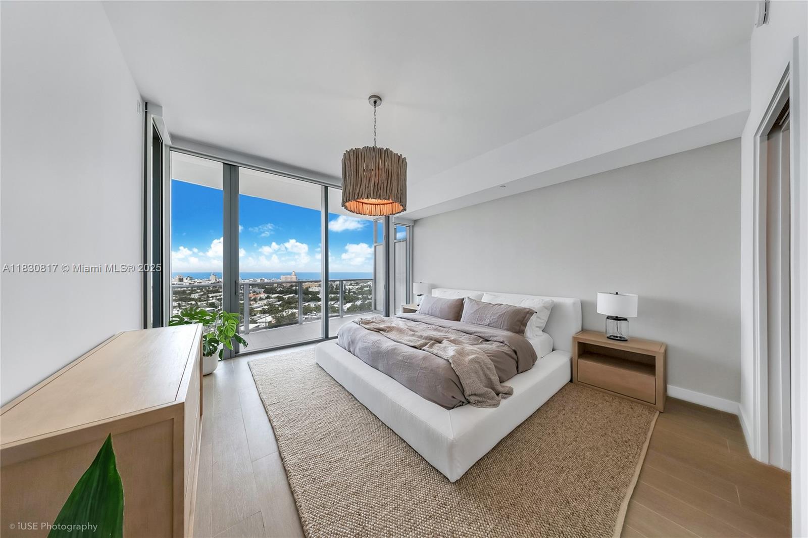 Wake up to breathtaking ocean views from Residence 1906 at Five Park — a turnkey 1BR, 1.5 BR home in Miami Beach’s newest luxury tower. This 1,010 SF residence features 10-ft ceilings, floor-to-ceiling windows, porcelain wood floors, electric blinds, and built-in closets. The chef’s kitchen includes Gaggenau appliances, Italian oak cabinetry, and quartzite countertops, while the marble-clad primary bath offers a spa-like retreat. Step onto your expansive terrace and take in unobstructed Atlantic Ocean views. Five Park offers 50,000 SF of amenities: two pools, spa, fitness center, restaurant with in-residence dining, private beach club, coworking lounge, screening room, and more — all just minutes from the marina, South of Fifth, and Miami Beach’s top spots. 1 assigned parking +valet