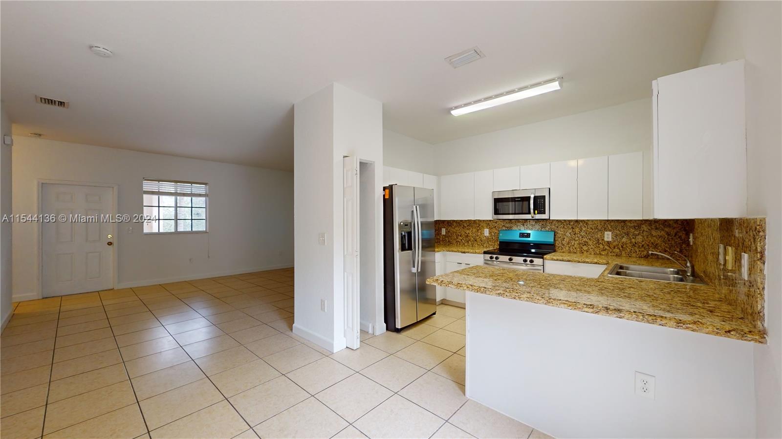 Beautiful spacious 2/2 apartment, gated community. New modern kitchen with quartz countertop, ceramic flooring all over, no carpet. Washer and dryer inside, and accordion shutters. Access to a wonderful pool, gym and more. Walking distance from Publix and many other stores. Will not last.  Besides the pictures, you can view a 360 interactive virtual tour by clicking on the virtual tour​​‌​​​​‌​‌​​​‌‌​​​‌‌‌​​‌​​‌‌​​​​ link.