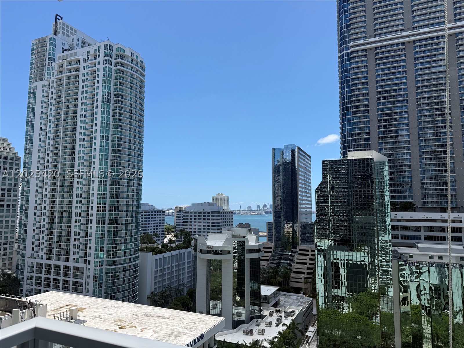 Live in the center of it all at 1060 Brickell Condo! This corner unit features great city and partial water views. Spacious and bright 1 Bedroom/1 Bath unit with generous living areas and modern kitchen with stainless steel appliances. Just updated, freshly painted, new light fixtures, new bathroom fixtures, california closet, brand-new washing and drying machine, additional built-in closet at the entrance, new blinds and shades. One assigned parking space conveniently located on the 3rd floor! Building amenities include state of the art fitness center with sauna & steam, business center, party room, pool table in game room, virtual golf, cigar room, massage room, 24-hour security & valet parking. Pool is under renovation until further notice. You will be in the heart of the Financial District, within walking distance to Brickell City Center, Mary Brickell Village, MetroMover and all the shopping and dining options this area has to offer. OPEN BALCONY (restoration completed) Easy to show.