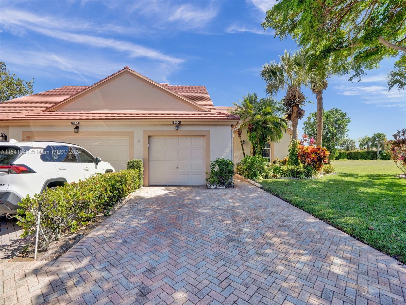Bring your offers, owner negotiable! Welcome home to this light & bright villa situated on a wide pie lot & cul-de-sac in the vibrant 55+ community of Emerald Pointe! This spacious 2/2 villa offers ample living space w formal living room, dining room, an additional den & as enclosed Florida room & one car garage & driveway for two cars. Freshly painted featuring high ceilings, updated lighting & Fans & recessed lighting, updated eat-in kitchen with pantry & beautiful countertops, tile flooring & new beautiful wood-plank laminate, newer shades, newer tankless water heater, double walk-in primary closets, newer frameless shower door & more! Original owners! Emerald Pointe offers residents an active lifestyle with many amenities & social events! No Leasing for 2 yrs. One pet under 15 lbs.