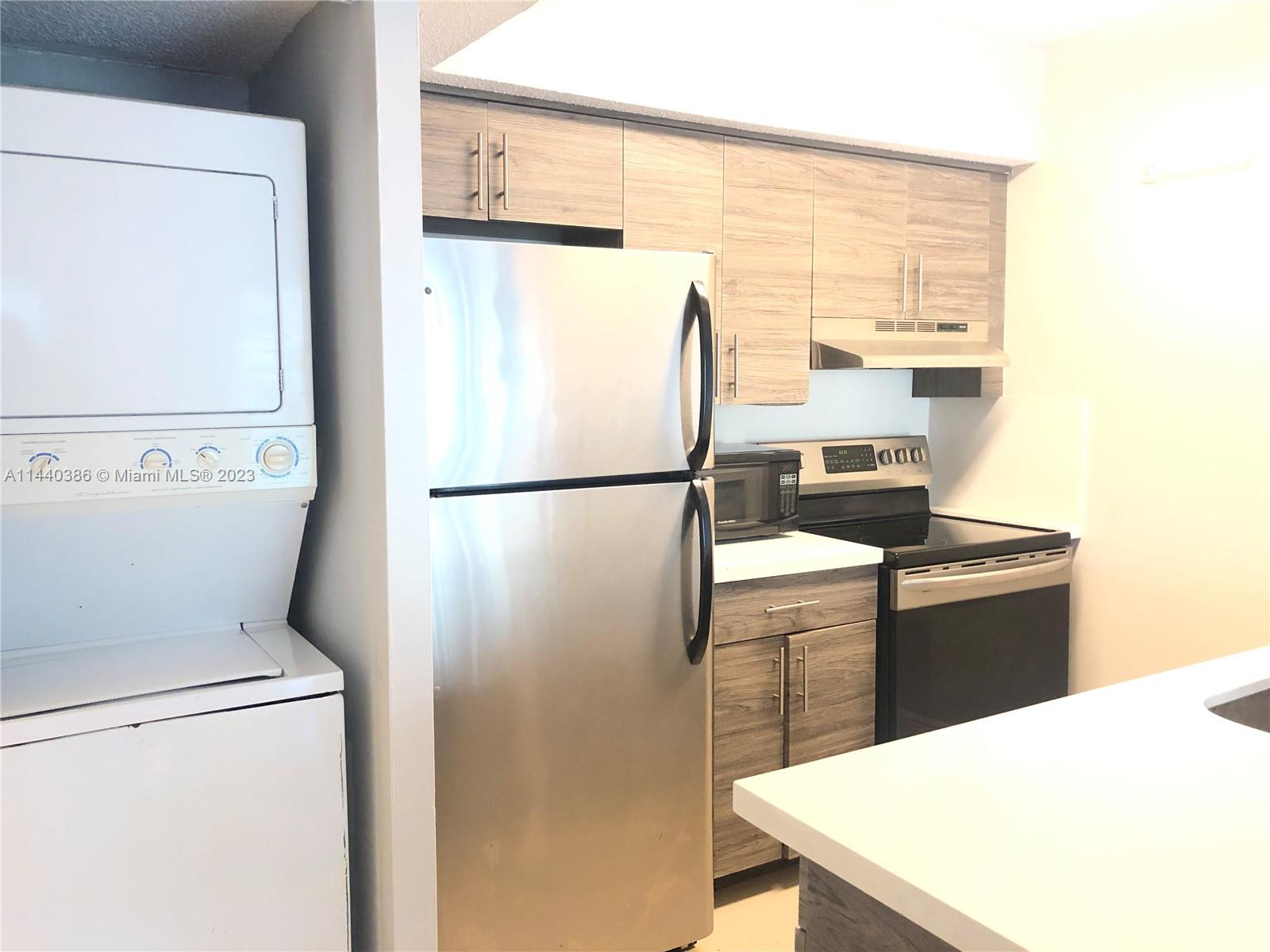 All Ages Welcome! Immediate move in available!! No association approval required! Live like a King or Queen in this uniquely beautifully and completely renovated 1 bed 1 bath. Unit features include VAULTED CEILINGS, NEW PORCELAIN TILE FLOORING, NEW KICHEN with stainless steel appliances, quartz countertops, new custom built cabinets, Renovated Bathroom, Private Washer/Dryer in the unit, screened balcony, and much more. Community features include Pool with BBQ area & Hot Tub, Tennis Court, Clubhouse, & Gym. Enjoy Easy access to the Turnpike Just off of Commercial Blvd. Immediate move in available, no association approval required. Won't last long... See it today!!!