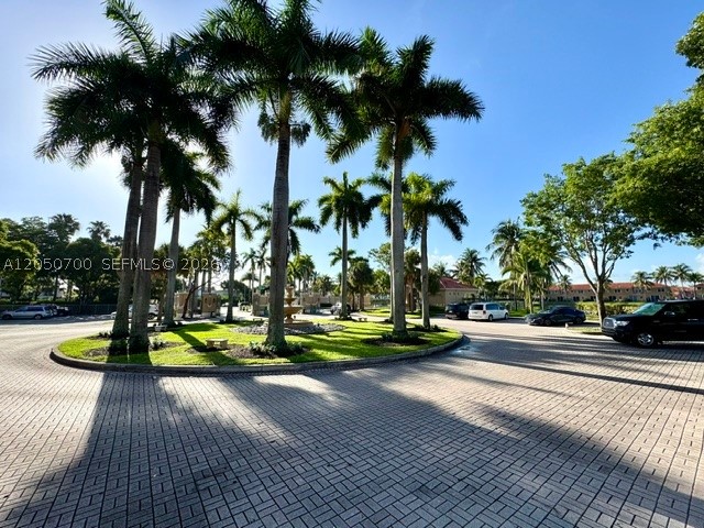 Beautiful and spacious 2-bedroom, 2.5-baths, storage. Condo located in the highly desirable gated community of The Courts at Doral Isles. This second-floor unit offers 1,115 SqFt of living space, split-bedroom layout that provides added privacy, tile flooring in all areas, The kitchen features stainless steel appliances, ample cabinet space,kitchen shelf organizers, and an in-unit washer and dryer for added convenience. Both bedroom have a walk-in closet and a private bathroom. Residents enjoy resort-style amenities such as a community pool, clubhouse, children's play areas, and 24-hour security. Parking includes one assigned space located directly in front of the unit, easy access, plus additional parking + guest parking. Excellent location in the heart of Doral, close to top-rated schools, shopping centers, restaurants, parks, and major highways. Quiet with pool, picnic area and kids playground. Ideal location and easy access to major highways! Easy to show!