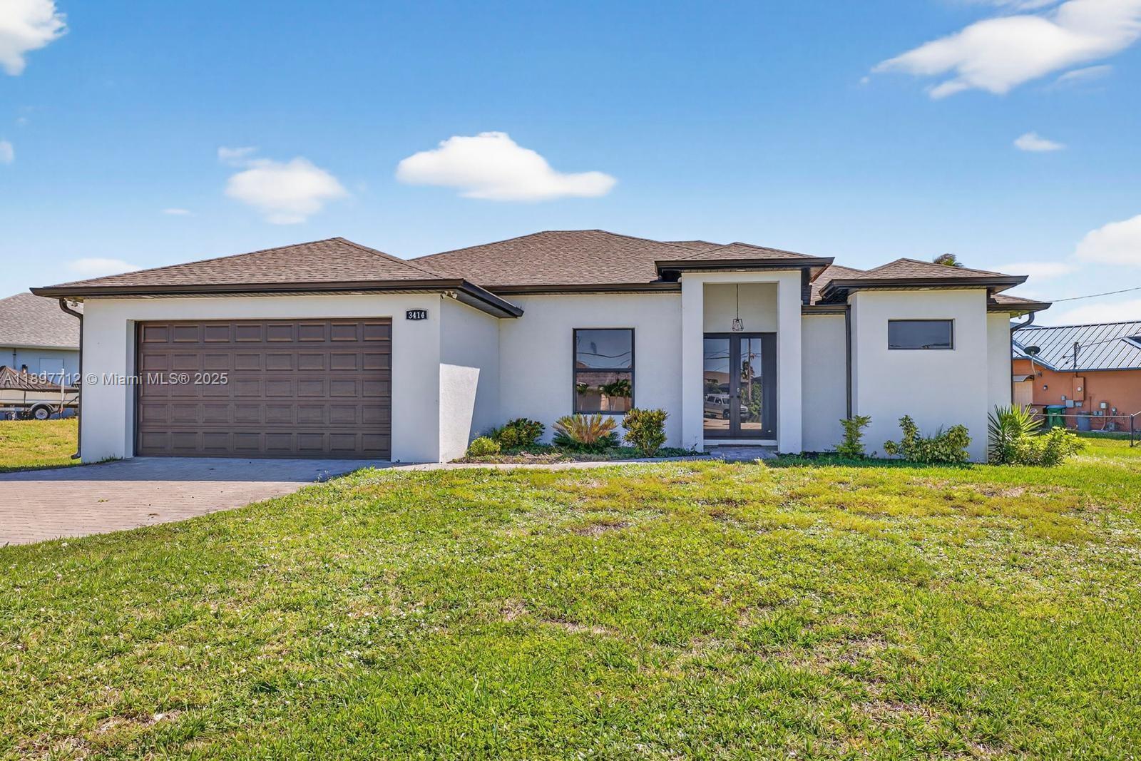 Welcome to this stunning Gulf Access home in the desirable NW Cape Coral area. Featuring 4 spacious bedrooms, 3 elegant bathrooms, and an open-concept layout perfect for modern living and entertaining.

The bright kitchen offers sleek finishes, stainless steel appliances, and ample cabinetry. Step outside to your private oasis with a heated pool, spa, outdoor kitchen, and large patio—ideal for year-round enjoyment.

Additional features include a 2-car garage, wide driveway, and a quiet location close to top-rated schools, shopping, dining, and recreation. Move-in ready to enjoy the best of waterfront Florida living.