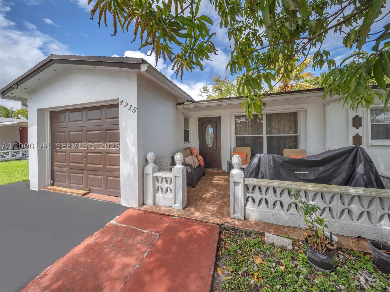 Welcome to your Home Sweet Home in Lauderdale Lakes! This charming single-story home with 3 Bedrooms and 1 Bathroom sits in a well-maintained 55+ community. From the moment you arrive, you’ll appreciate the paved driveway, one-car garage, and inviting curb appeal. A mature shade tree adds character and shade to the front yard, while the cozy front porch is the perfect spot to relax and enjoy the South Florida breeze. Step inside , the main living and dining areas feature tile flooring throughout, creating a seamless flow that’s perfect for everyday living and entertaining. The kitchen is well-equipped with stainless steel appliances, ample cabinetry, and generous counter space. The 3 comfortable and generously sized bedrooms, along with a well-maintained bathroom featuring a dual-sink vanity and great storage. In addition to the main living space. Step outside to enjoy your private yard with mature landscaping, offering plenty of space to relax, garden, or host guests. Conveniently located near major highways, shopping, dining, and everyday essentials, this home offers both comfort and accessibility. This is an opportunity you don’t want to miss. Schedule your private showing today!