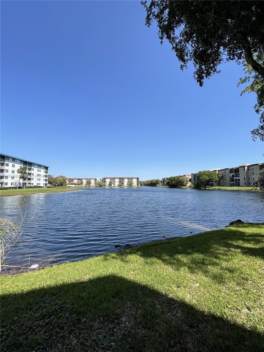 Just Reduced...priced to rent quickly! Completely remodeled two bedroom, two bathroom unit with very nice lake and pool area views from both bedrooms and the enclosed balcony. Features a brand new kitchen, bathrooms, appliances, doors, closets and porcelain tile floors. Just under 1,200 sqft. Unit comes with one assigned parking space and one guest space (2 parking spots). Plenty of guest parking as well. Centrally located just minutes from the 836 and Palmetto expressways and the airport. No laundry in unit - common laundry room on first floor and no dishwasher. NO pets allowed per the association. Available immediately!