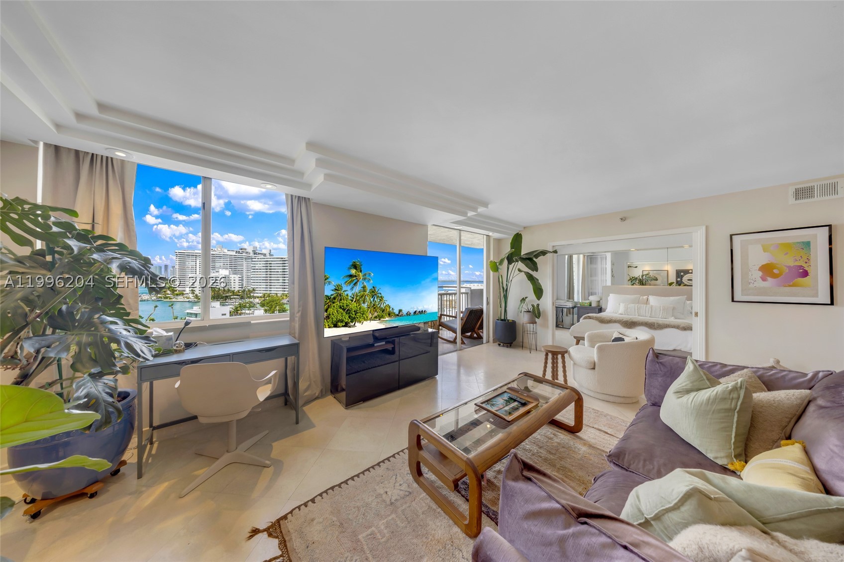 Welcome to Unit 802 at 1621 Bay Road, a bright and spacious home with a layout that really stands out. Originally a three-bedroom, it’s been opened up into a large two-bedroom, creating an oversized living area that’s hard to find and perfect for both relaxing and entertaining.
The open kitchen flows seamlessly into the living and dining space, while large windows fill the home with natural light, giving it an airy, inviting feel throughout. Step outside onto one of 2 private balconies, ideal for enjoying your morning coffee or unwinding at the end of the day.
Additional highlights include an in-unit washer and dryer and 2 dedicated parking spaces, offering both comfort and convenience. With its flexible layout and generous living space, this home is a great fit for anyone looking for something more open and easy to live in.
