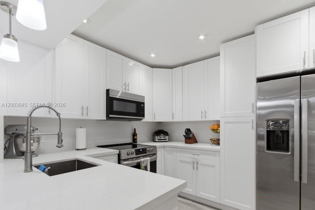 OPTIMA VILLAGE I-E CONDO - Residential