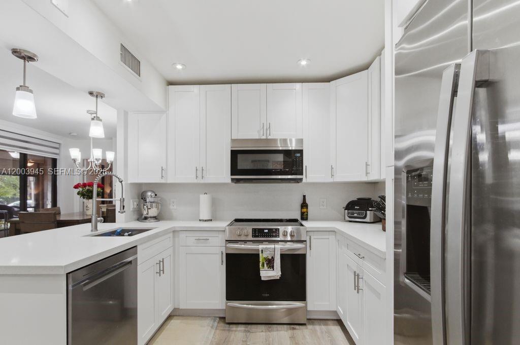 OPTIMA VILLAGE I-E CONDO - Residential
